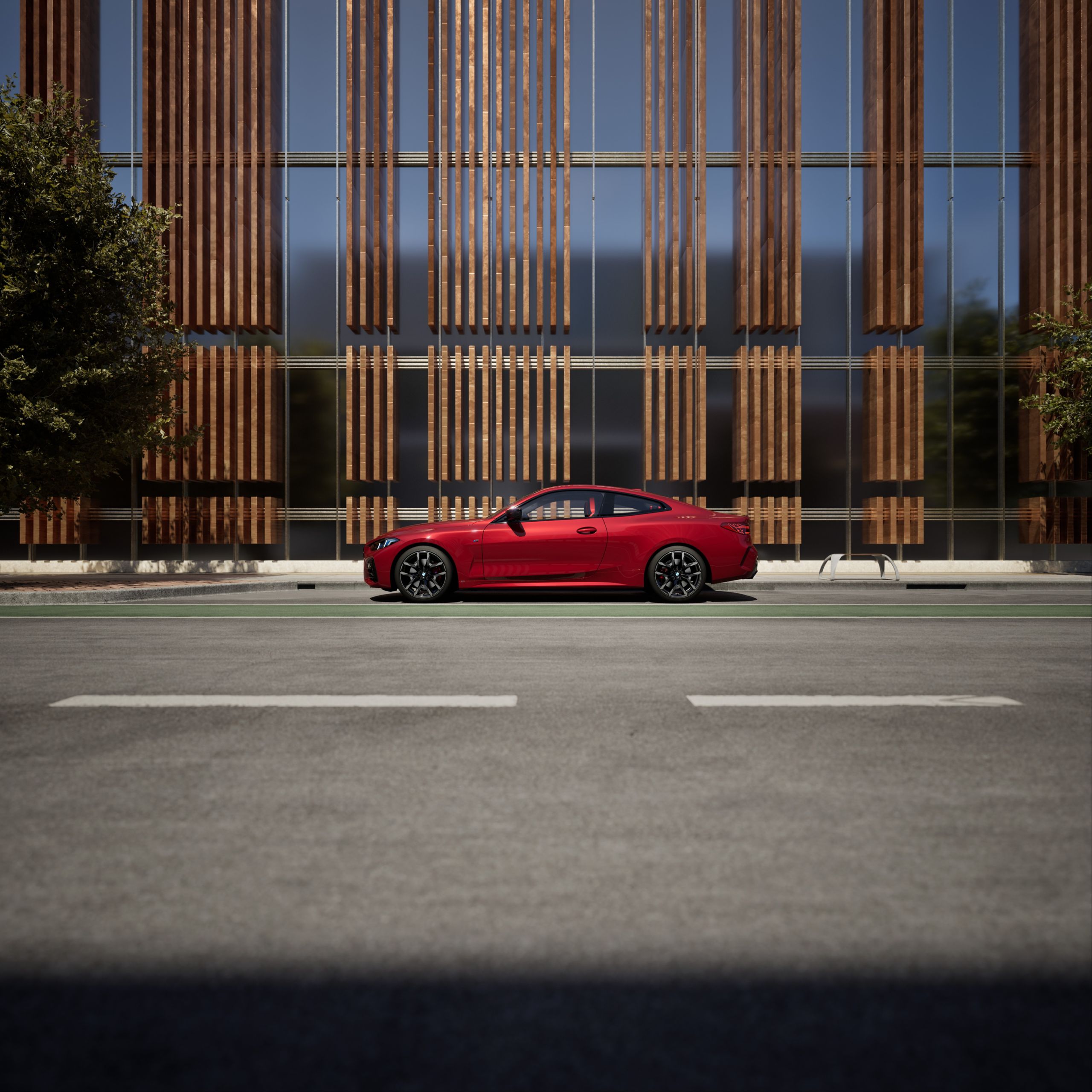 Red BMW near building