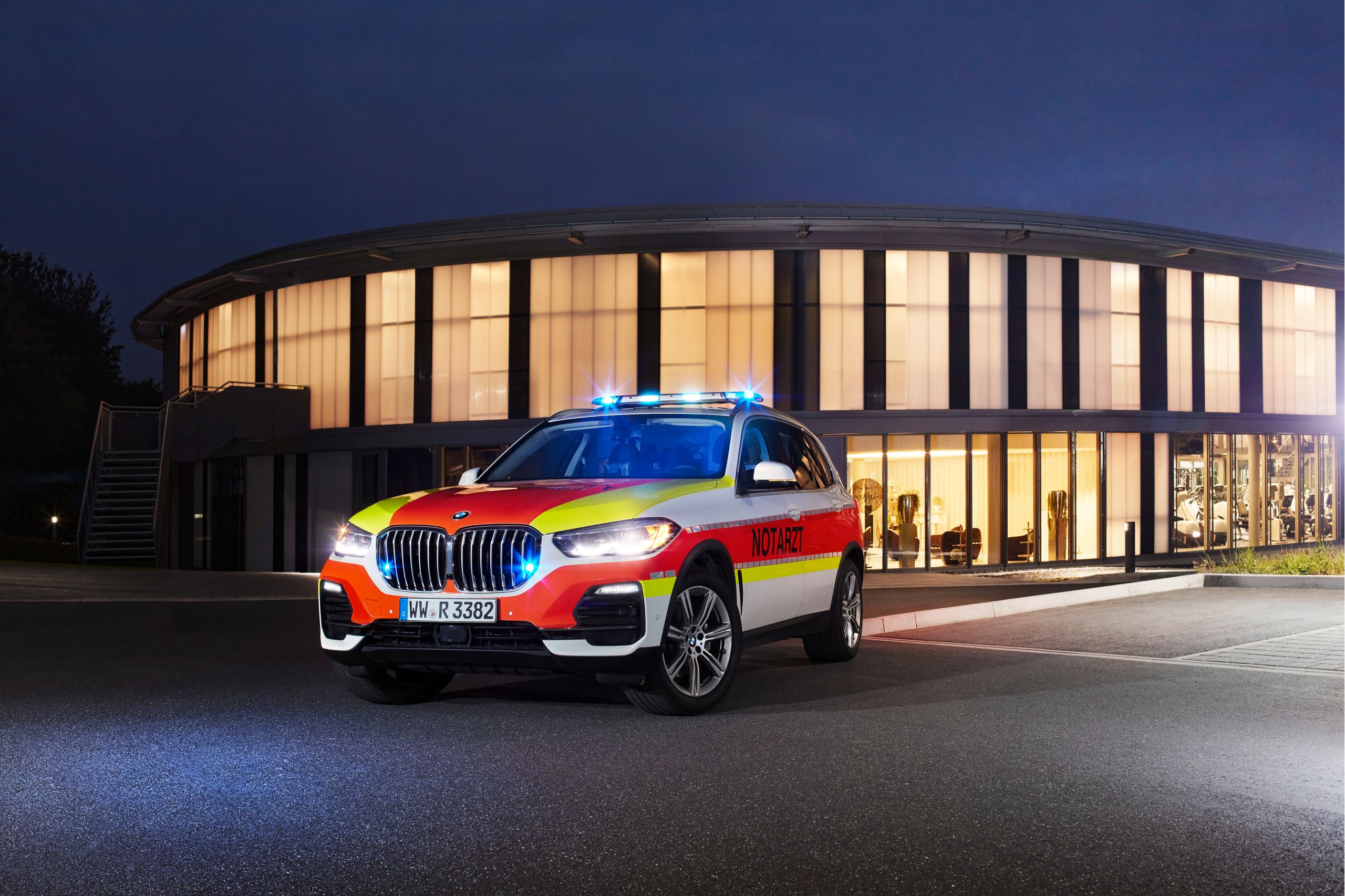 A BMW police vehicle in front of a building
