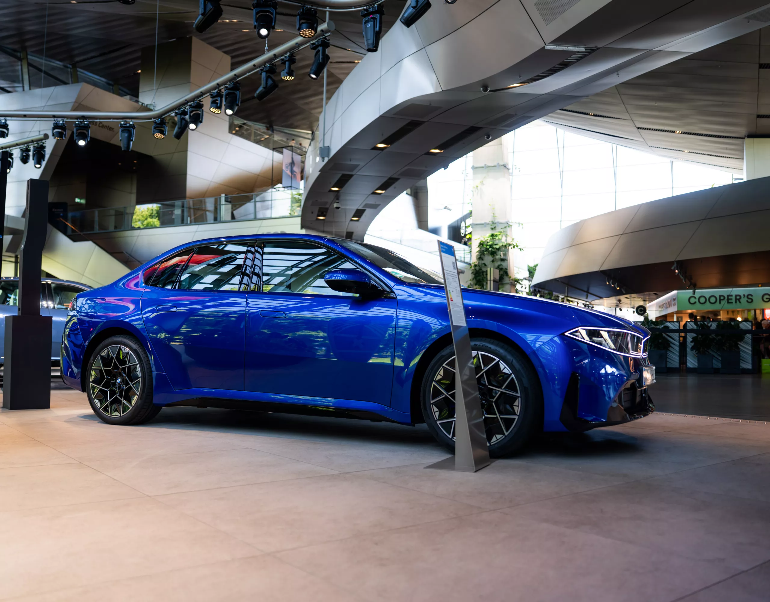 Side view of a blue BMW i3 at BMW Welt.