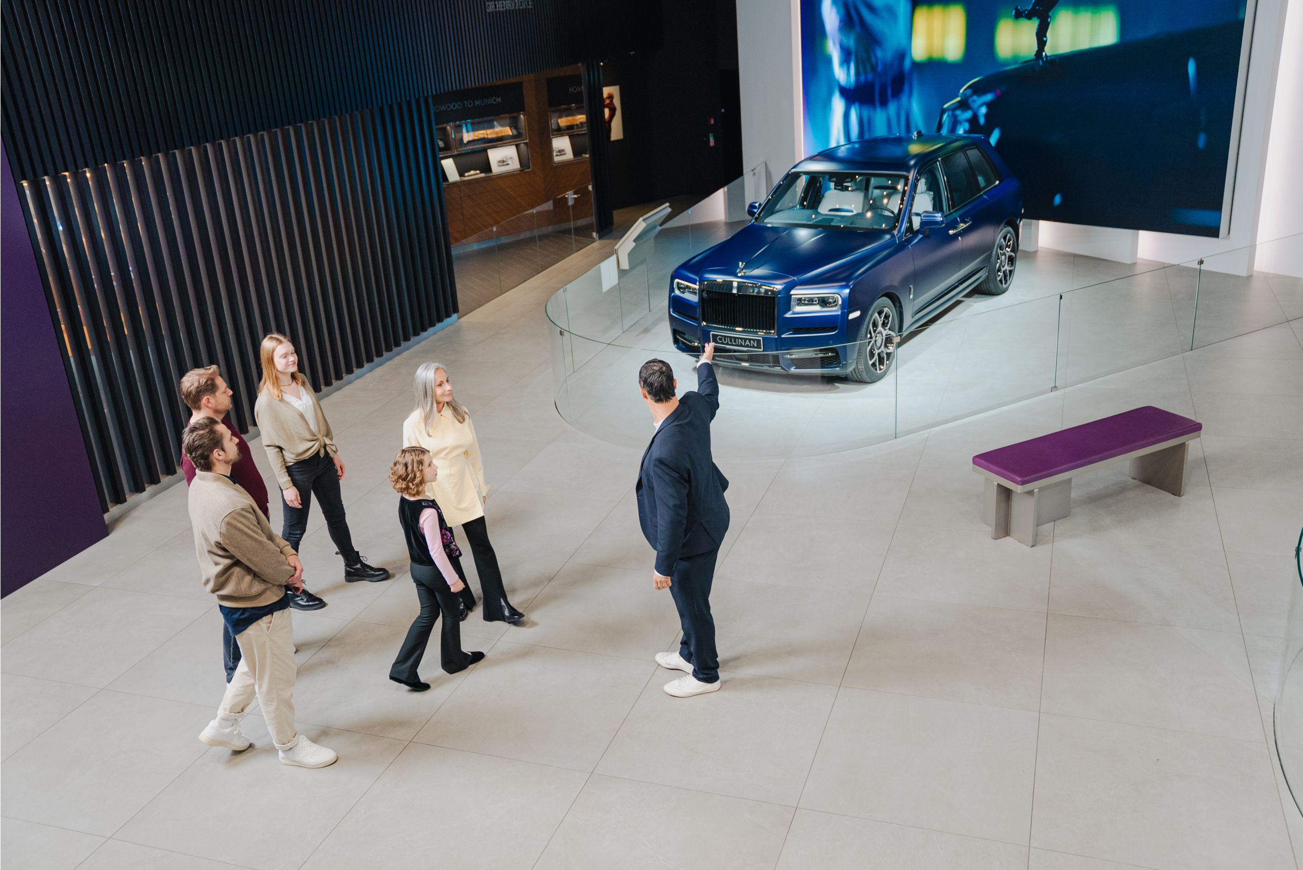 Group is guided through the Rolls Royce exhibition at BMW Welt