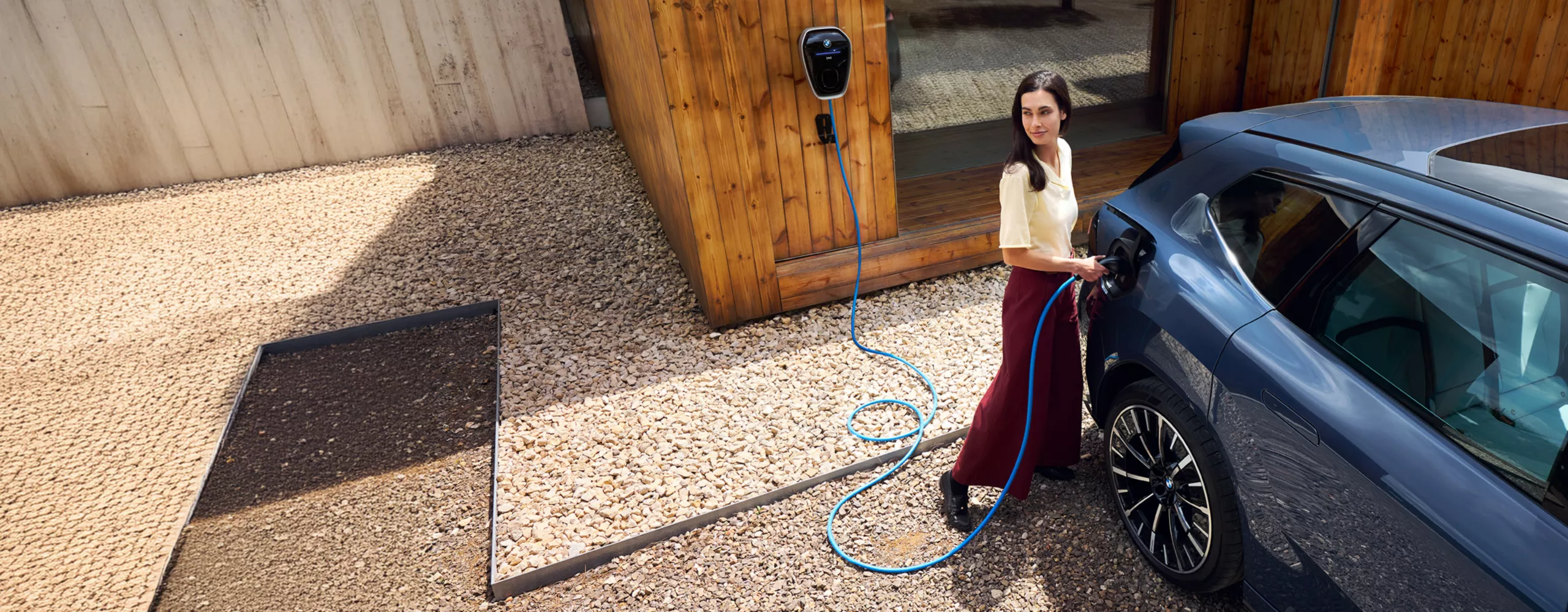 Woman Charging BMW