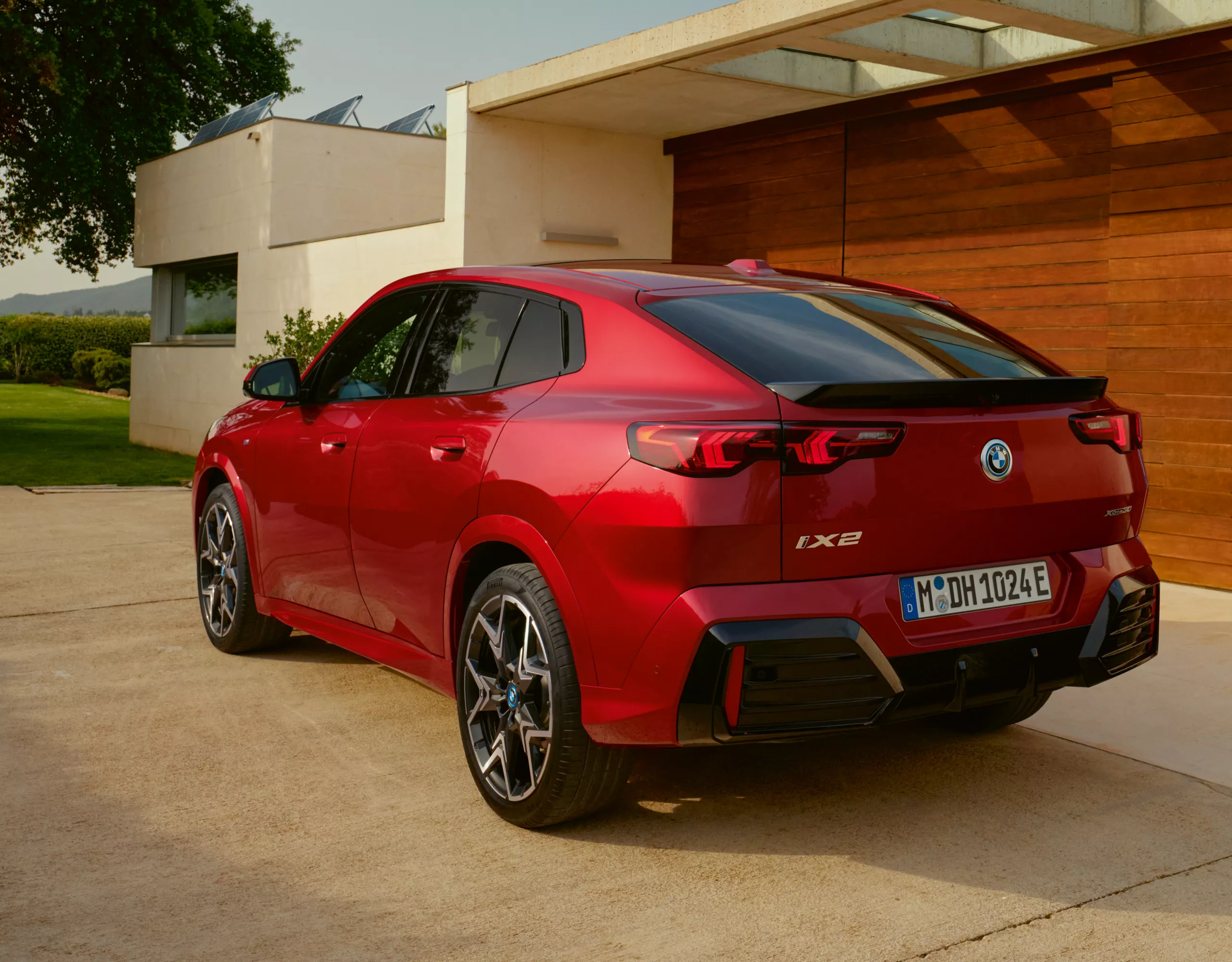 BMW iX2 red rear view 