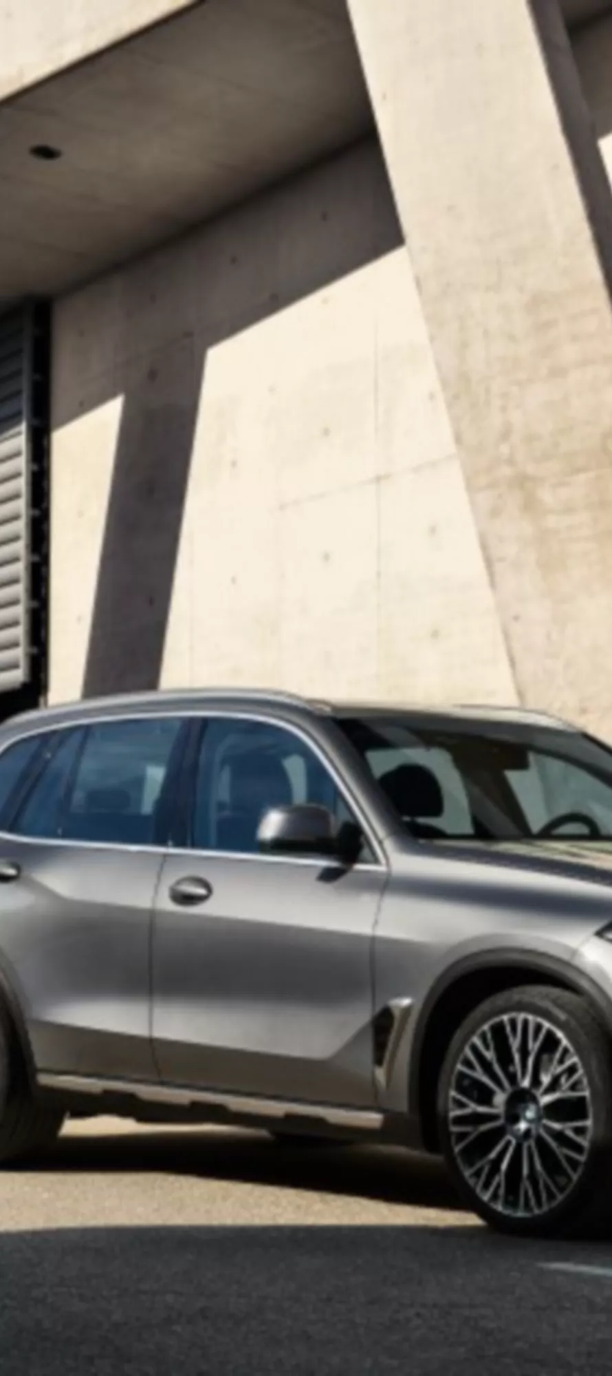 BMW Financial Services BMW Leasing woman puts her feet on the door of a BMW
