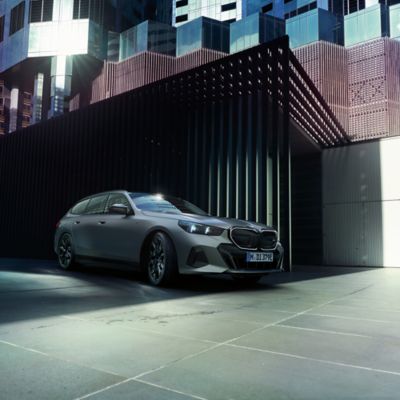 BMW M5 Touring grey front view 