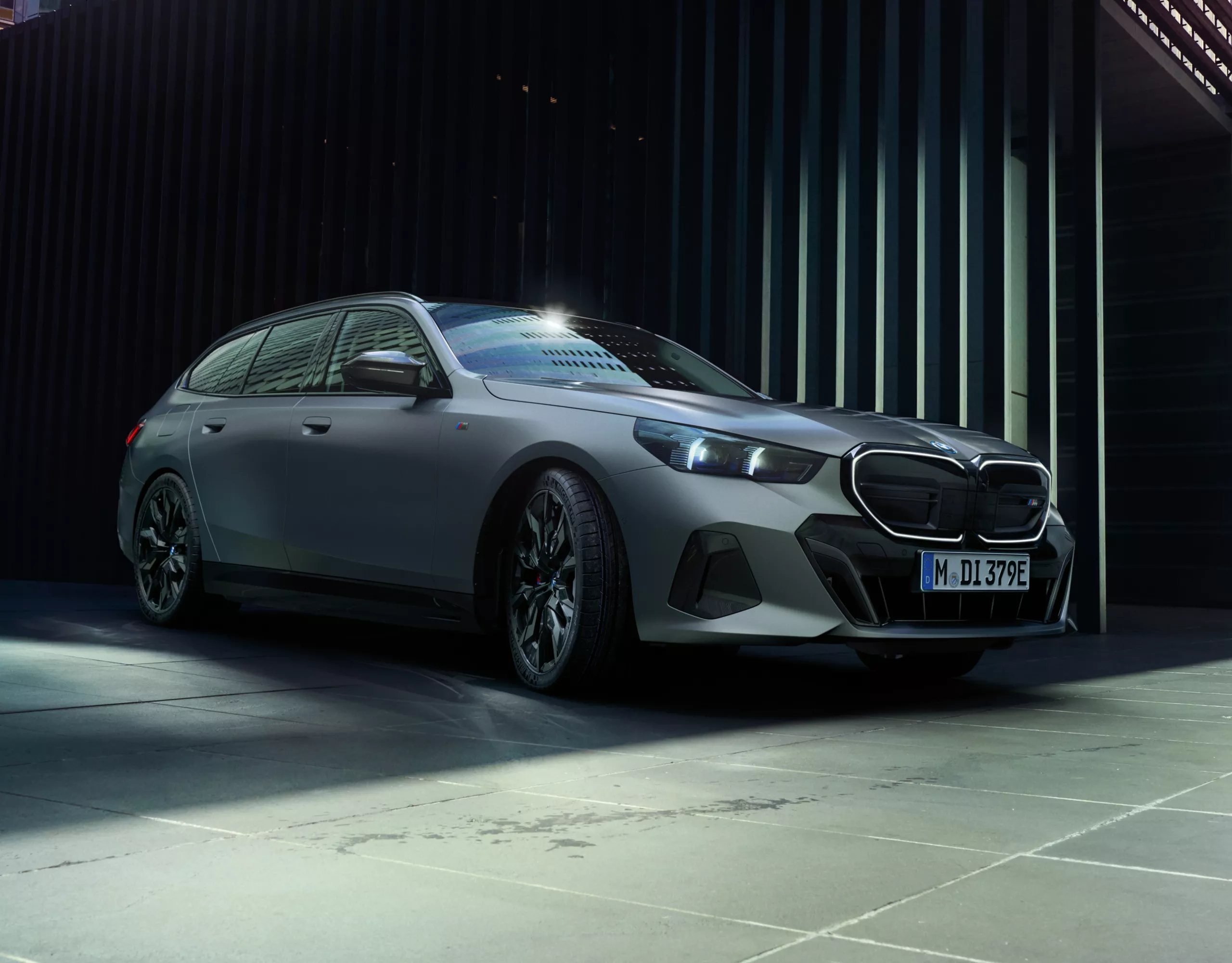 BMW M5 Touring grey front view 