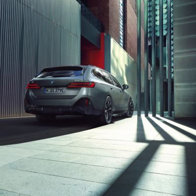 BMW M5 Touring grey rear view 