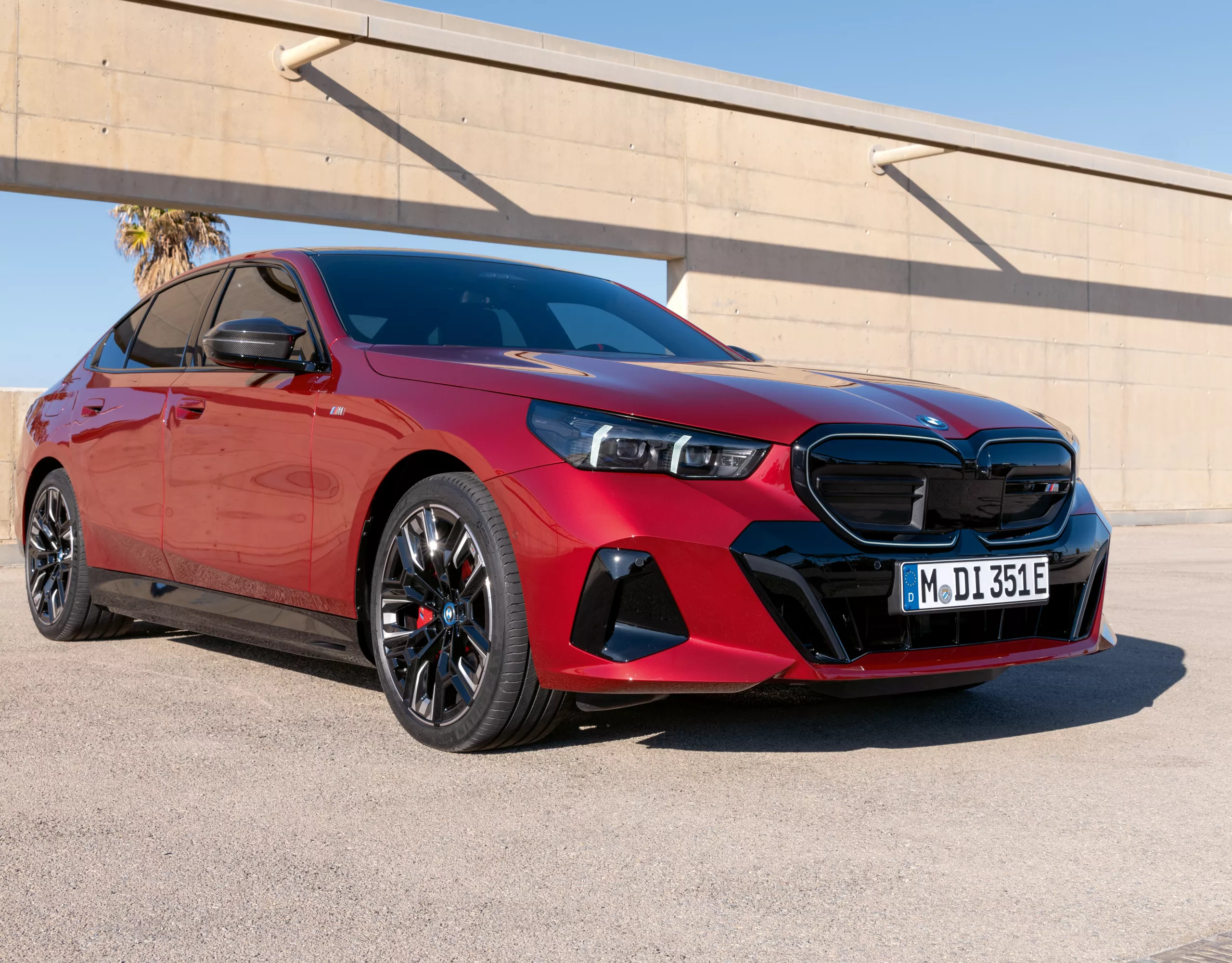 BMW M5 Sedan red front view