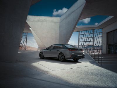 BMW M760e xDrive black rear view