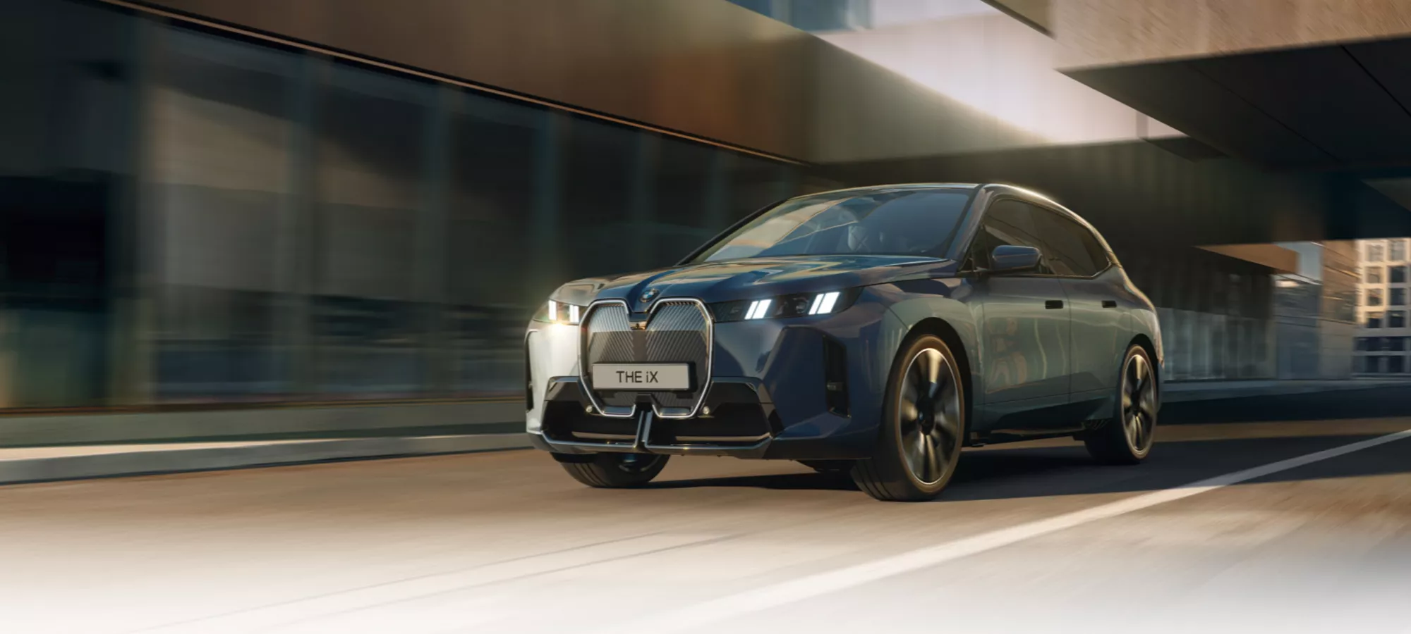 BMW Vision Neue Klasse Concept Car 2023 Exterior driving on rural road