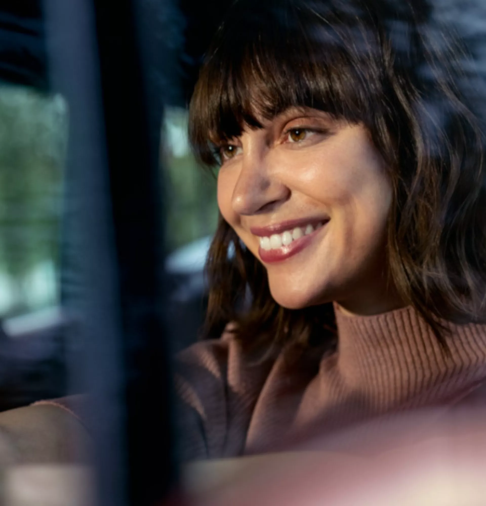 BMW Service Inclusive - smiling woman driving
