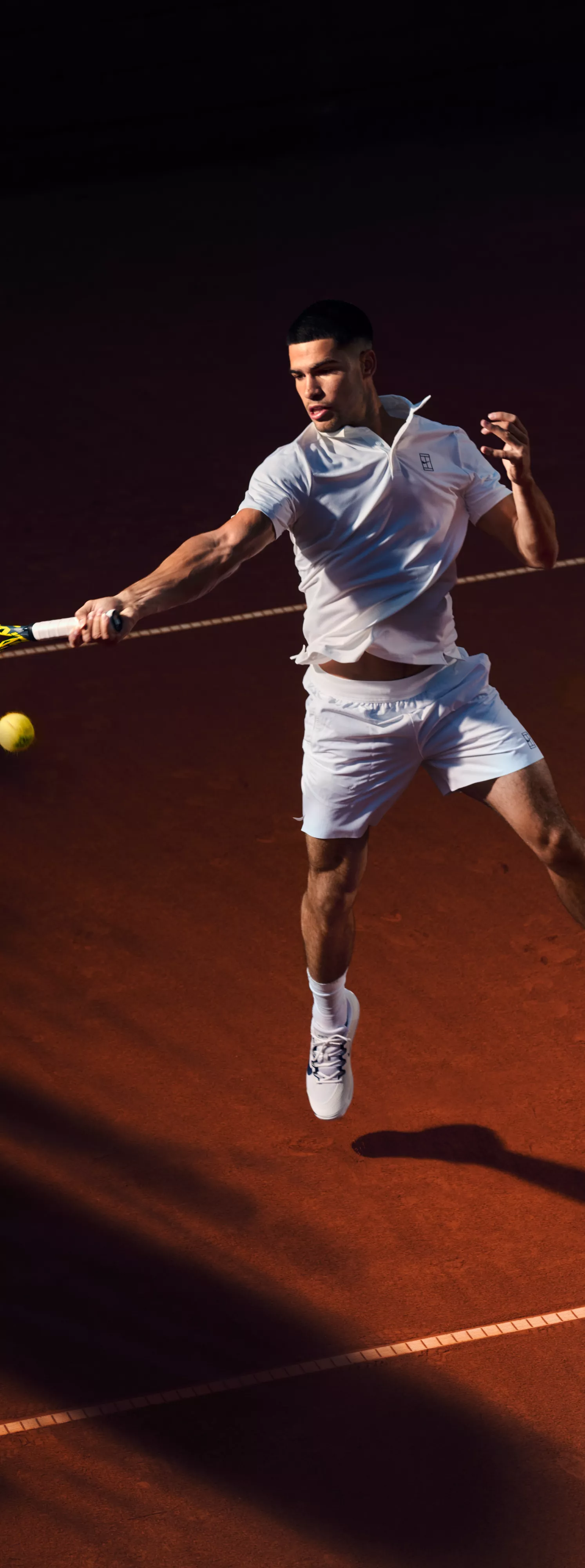 Carlos Alcaraz playing tennis