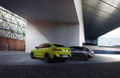 BMW X4 M yellow/grey rear view 