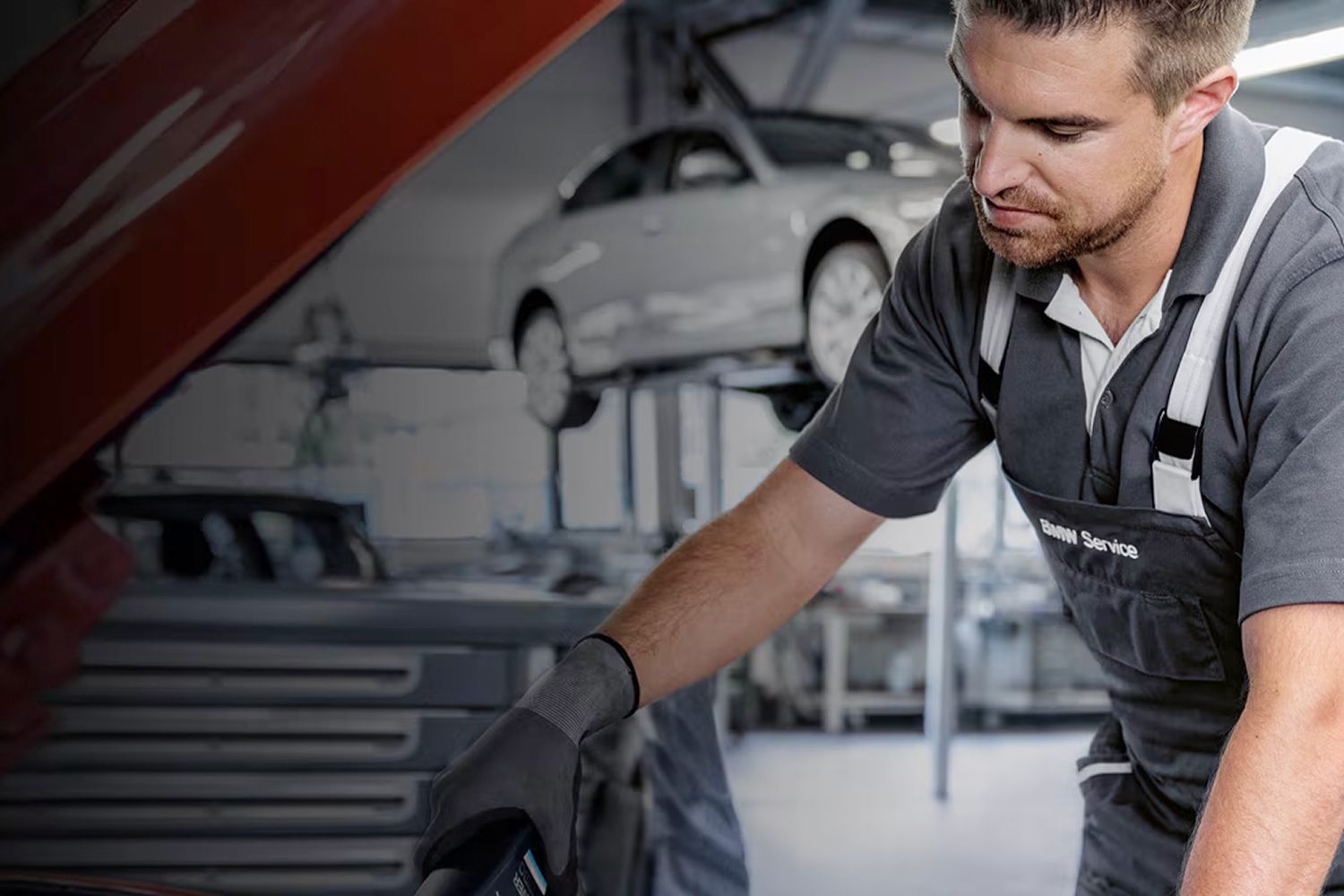 A BMW Service technician in a maintenance center