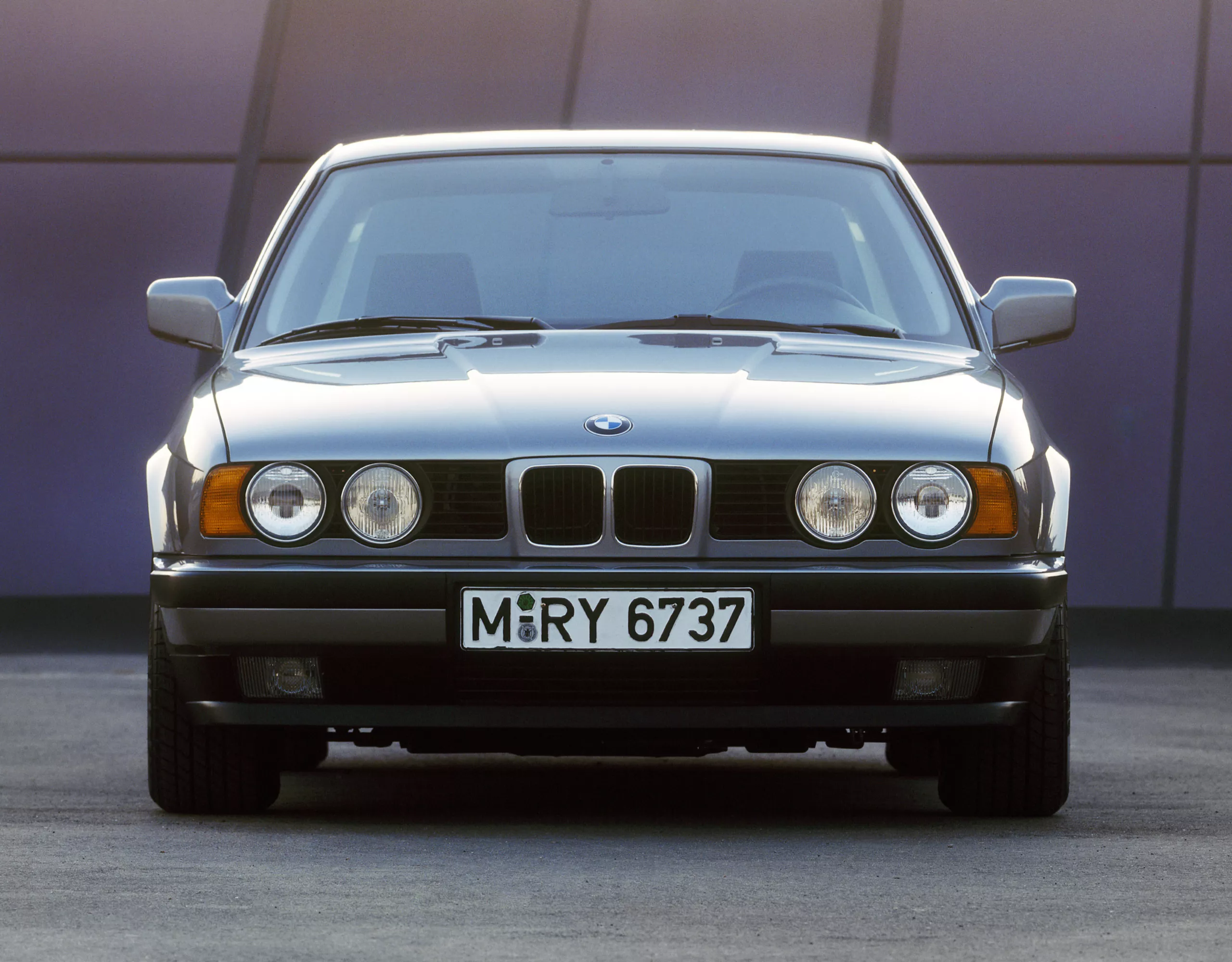 BMW M5 Sedan (E34) three-quarter frontal view while parked