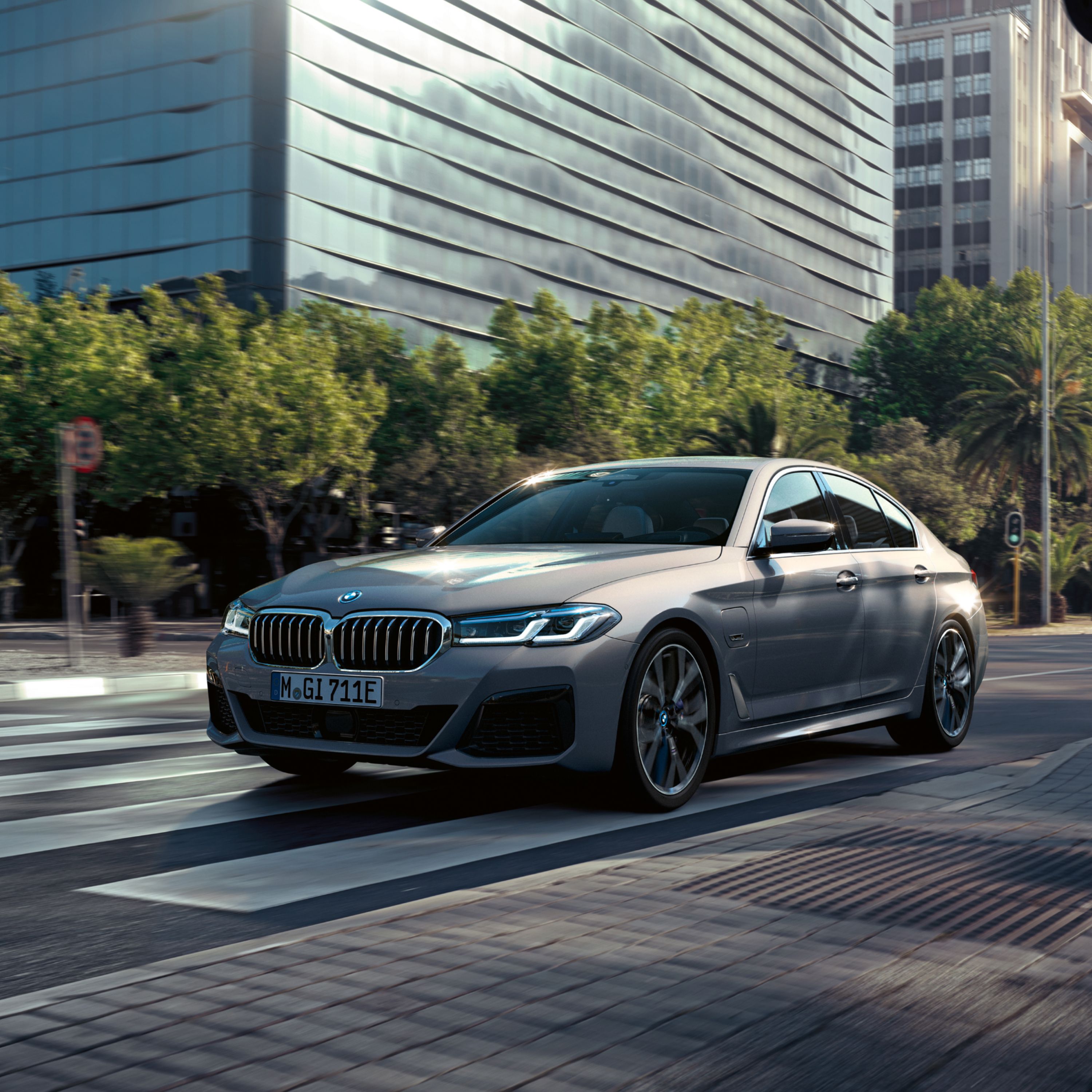 BMW 530e Sedan (G30) three-quarter frontal view while driving