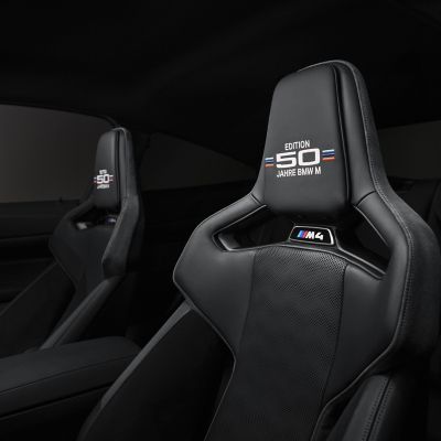 Interior of the BMW M4 Competition Edition 50 Years of BMW M with anniversary badging on the head restraints