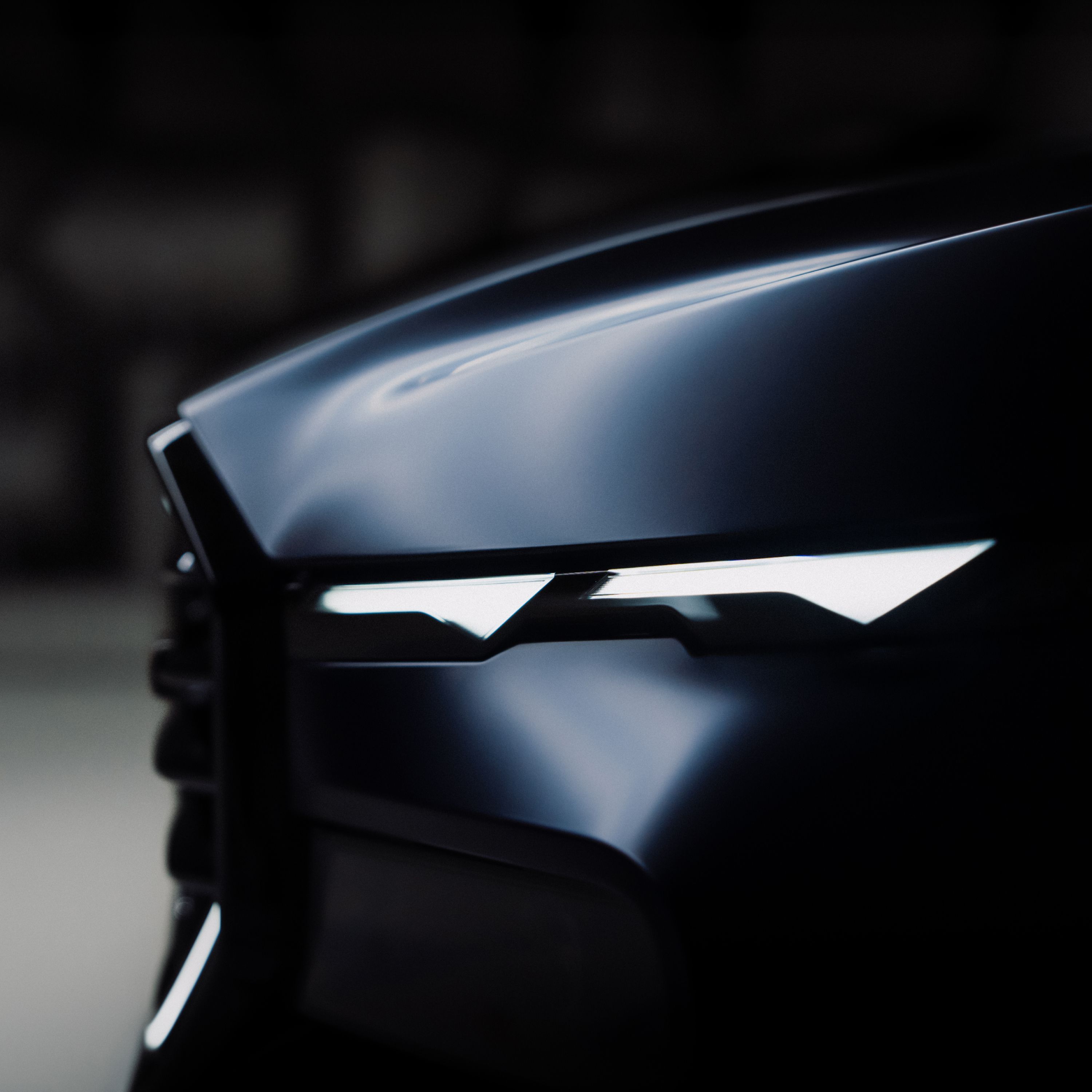 Frontausschnitt mit Scheinwerfer eines BMW XM Label in BMW Individual Mattlackierung