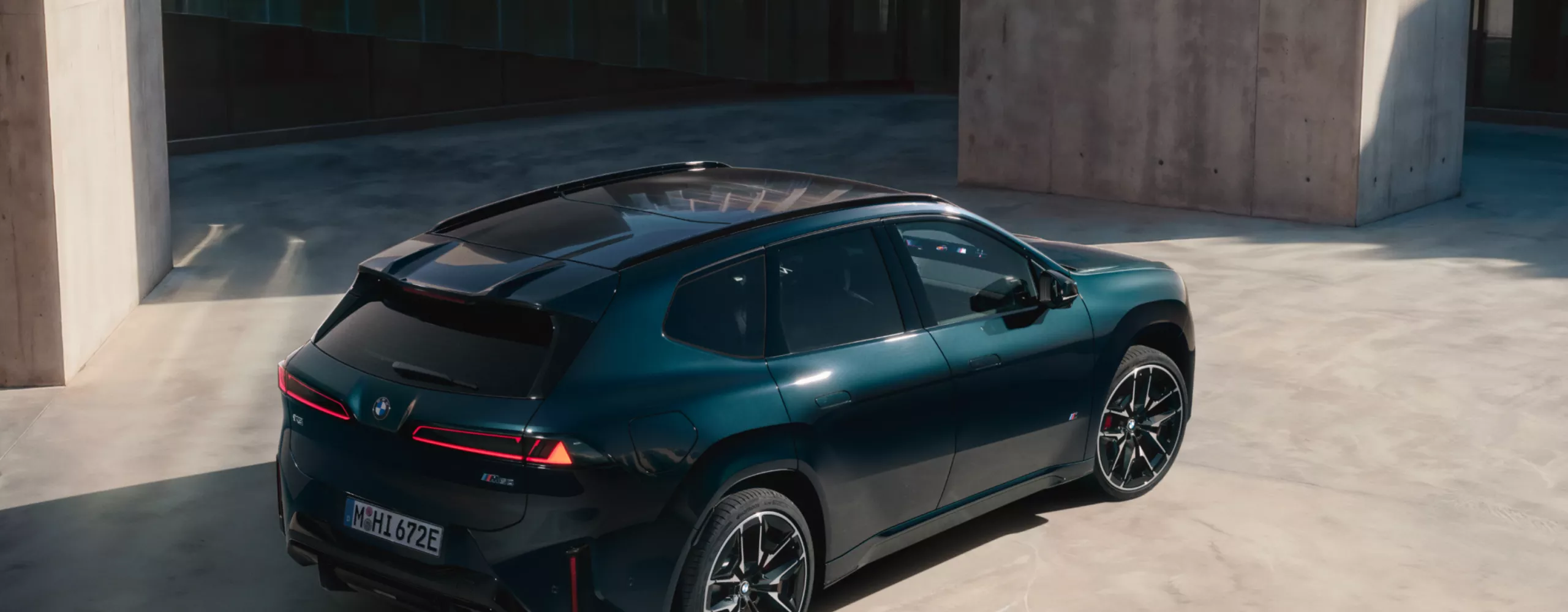 BMW iX3 M60 xDrive with panoramic glass sunroof with climate comfort glass extending to the rear