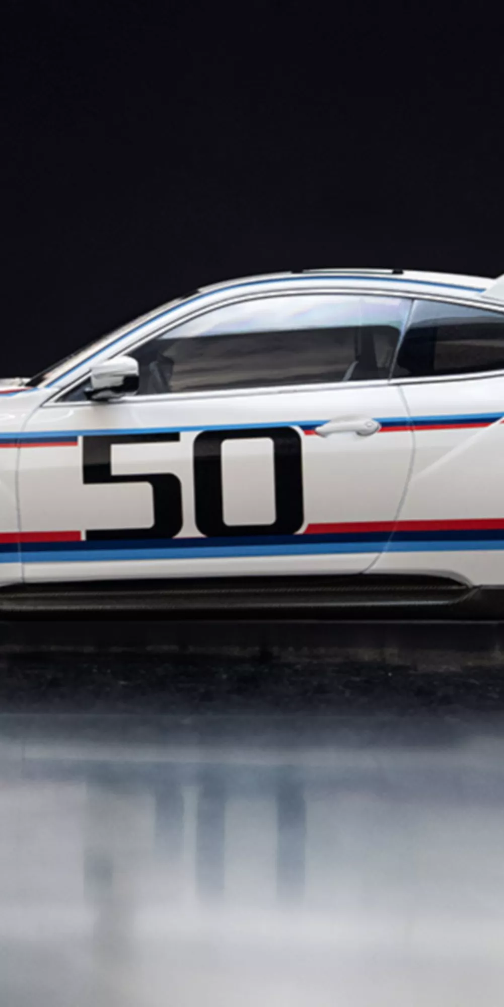 BMW Lifestyle BMW 02 miniature in yellow in a miniature environment