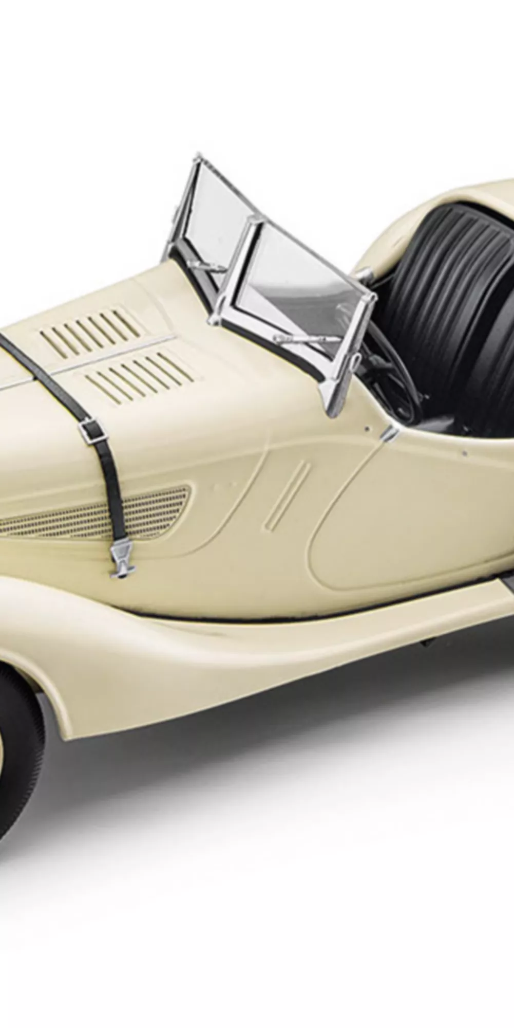 BMW Lifestyle BMW M3 E30 miniature with Seehaus stripes and the number 25 on the door panel on a miniature racetrack