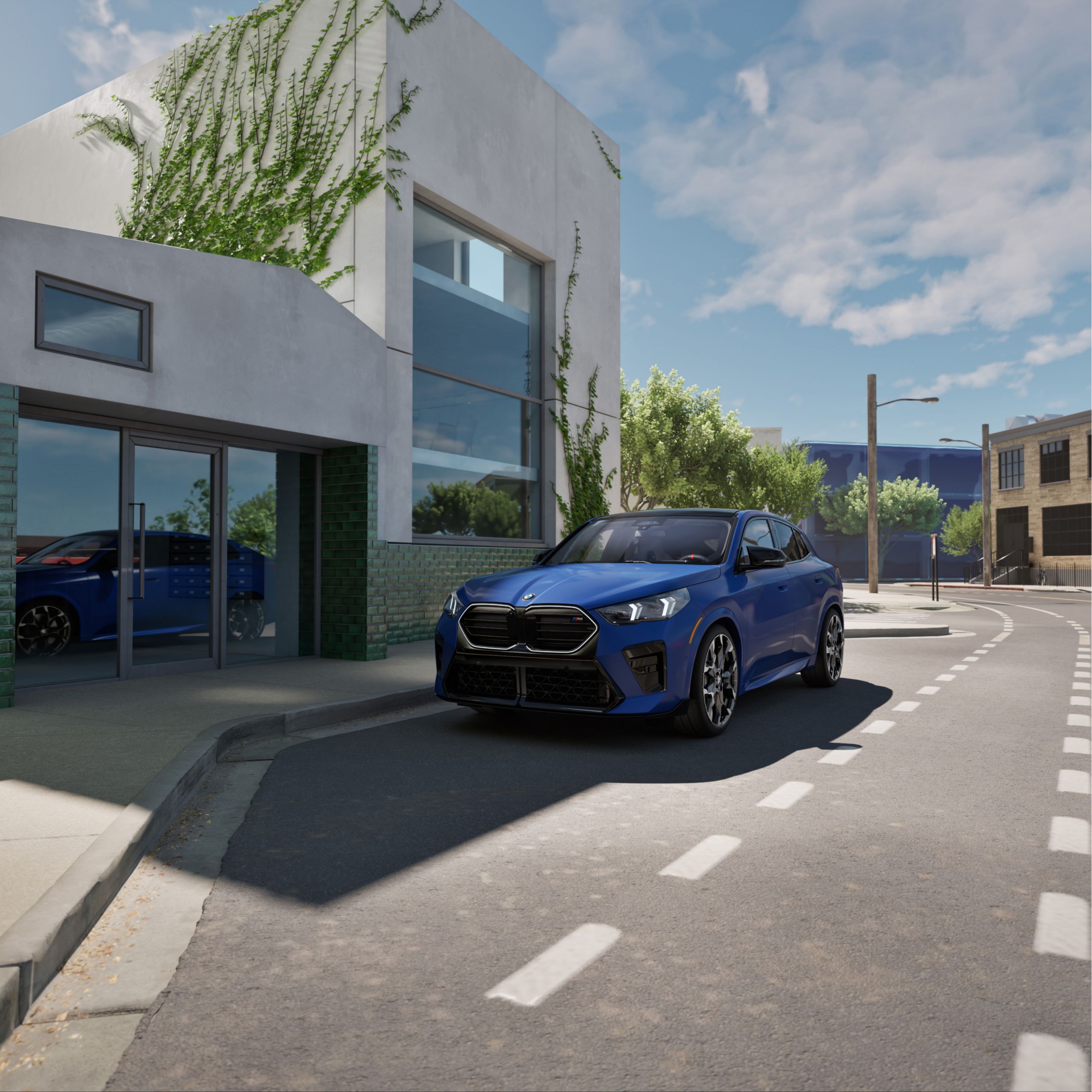 The BMW X2 M35i in front of an office building in an urban environment