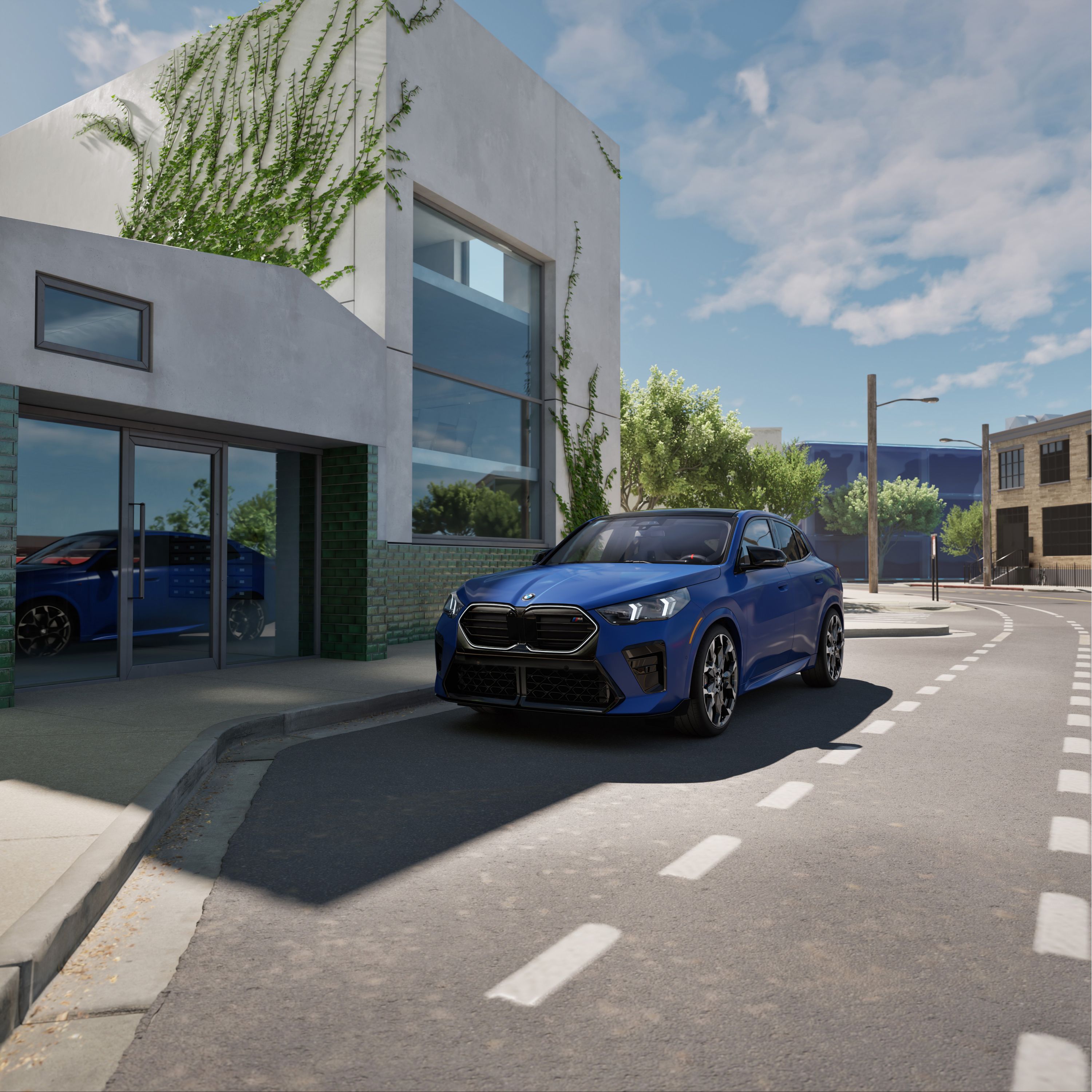 The BMW X2 M35i in front of an office building in an urban environment