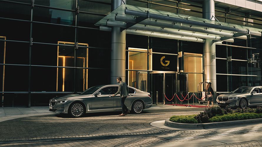 BMW Military Sales military vehicles BMW standing in front of the US flag