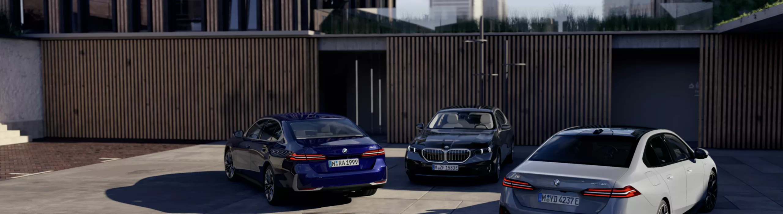 BMW Vendas Corporativas para empresas e clientes corporativos na frente de um BMW