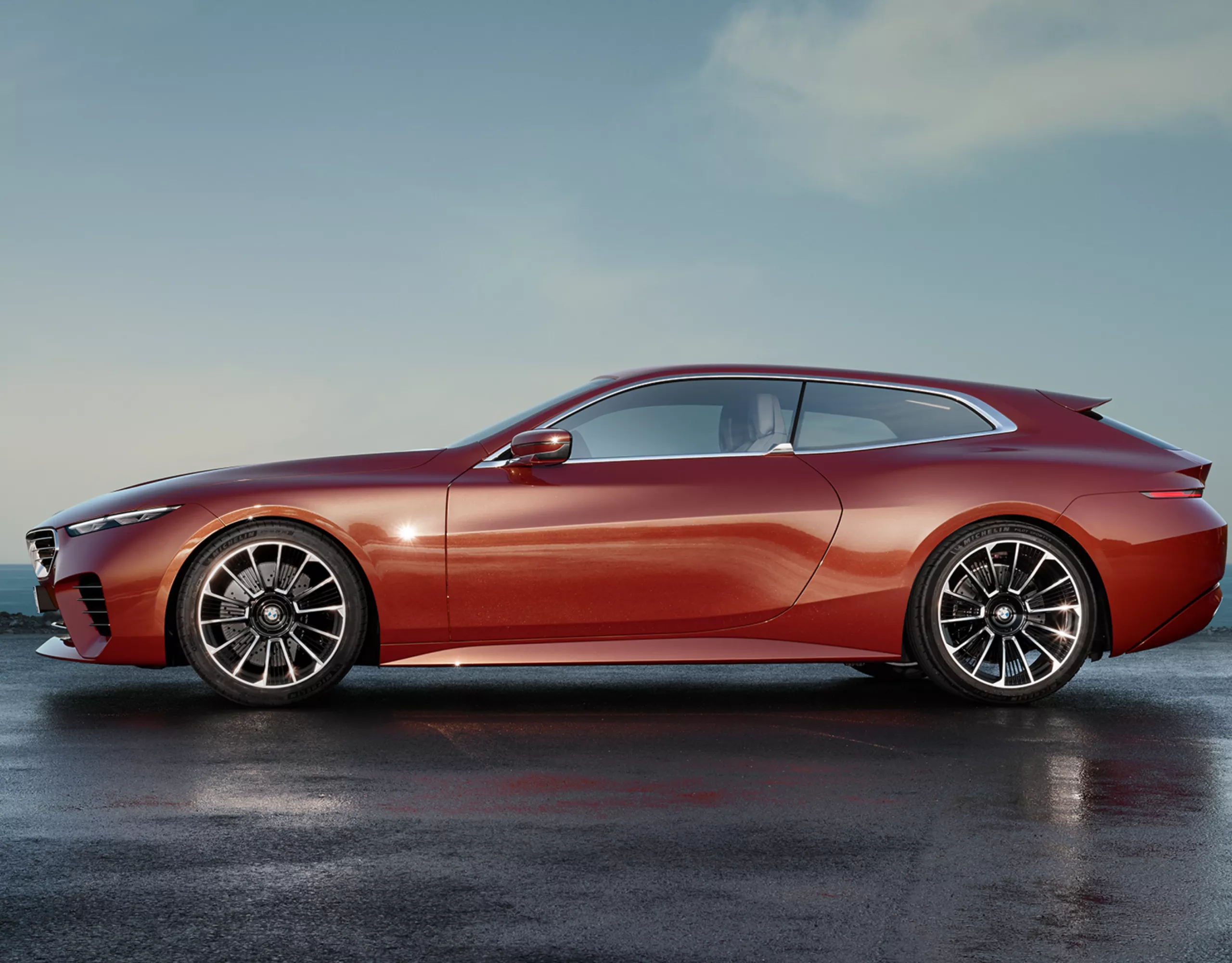 The BMW Speedtop is shown from a lower side perspective, accentuating the athletic form 