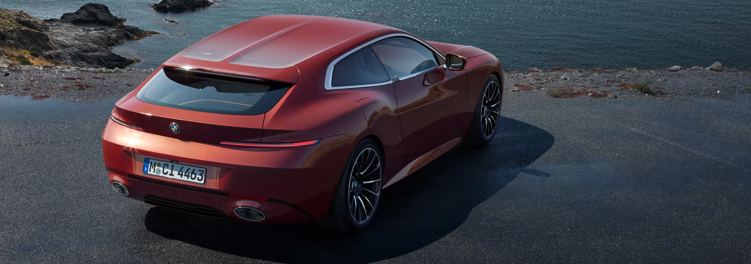 Pohled na zadní část exteriéru BMW Speedtop zaparkované čelem k pobřeží
