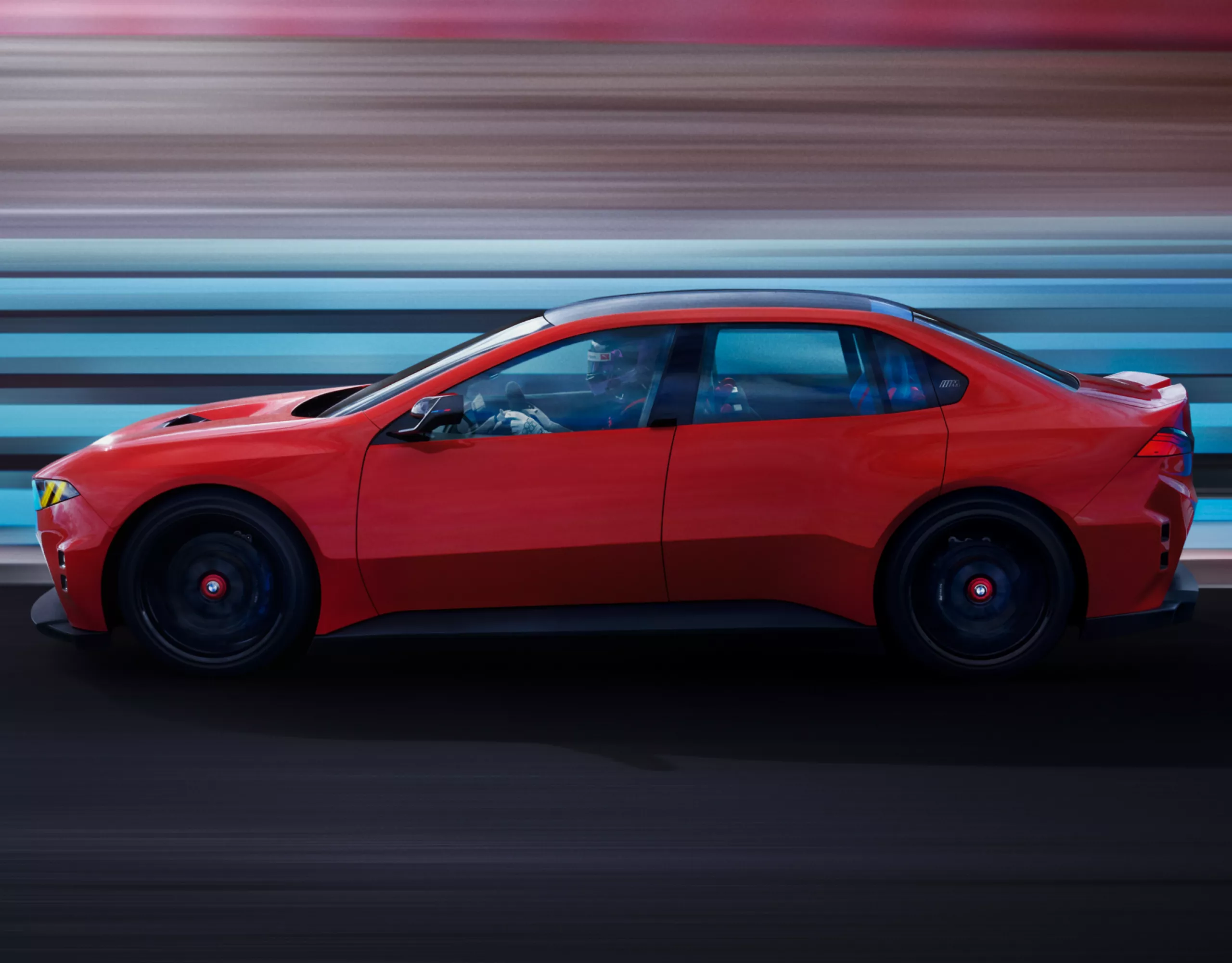 A BMW M Concept Neue Klasse oldalnézete izmos arányokkal.
