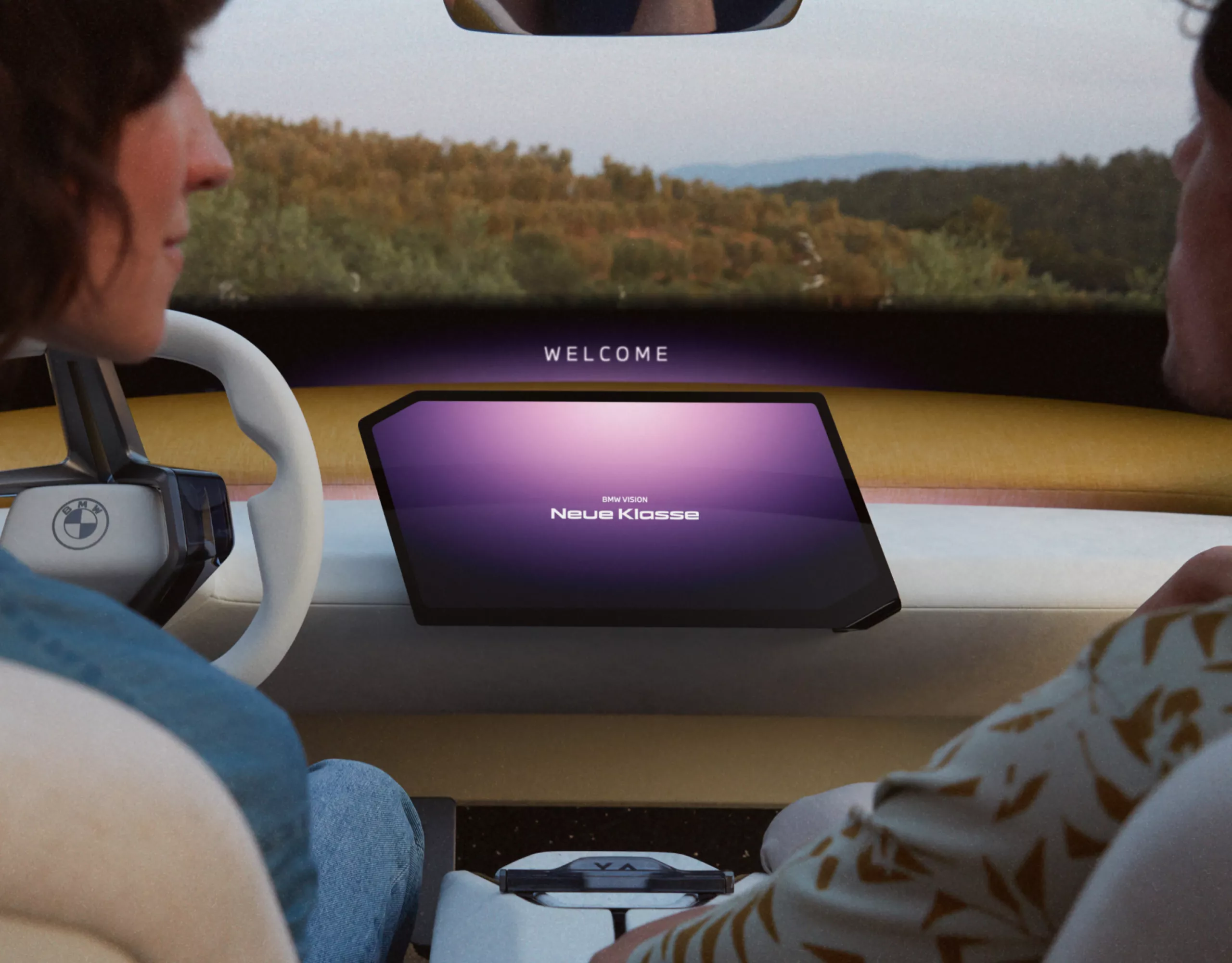 BMW Vision Neue Klasse Concept car 2023 interior dashboard display and two people