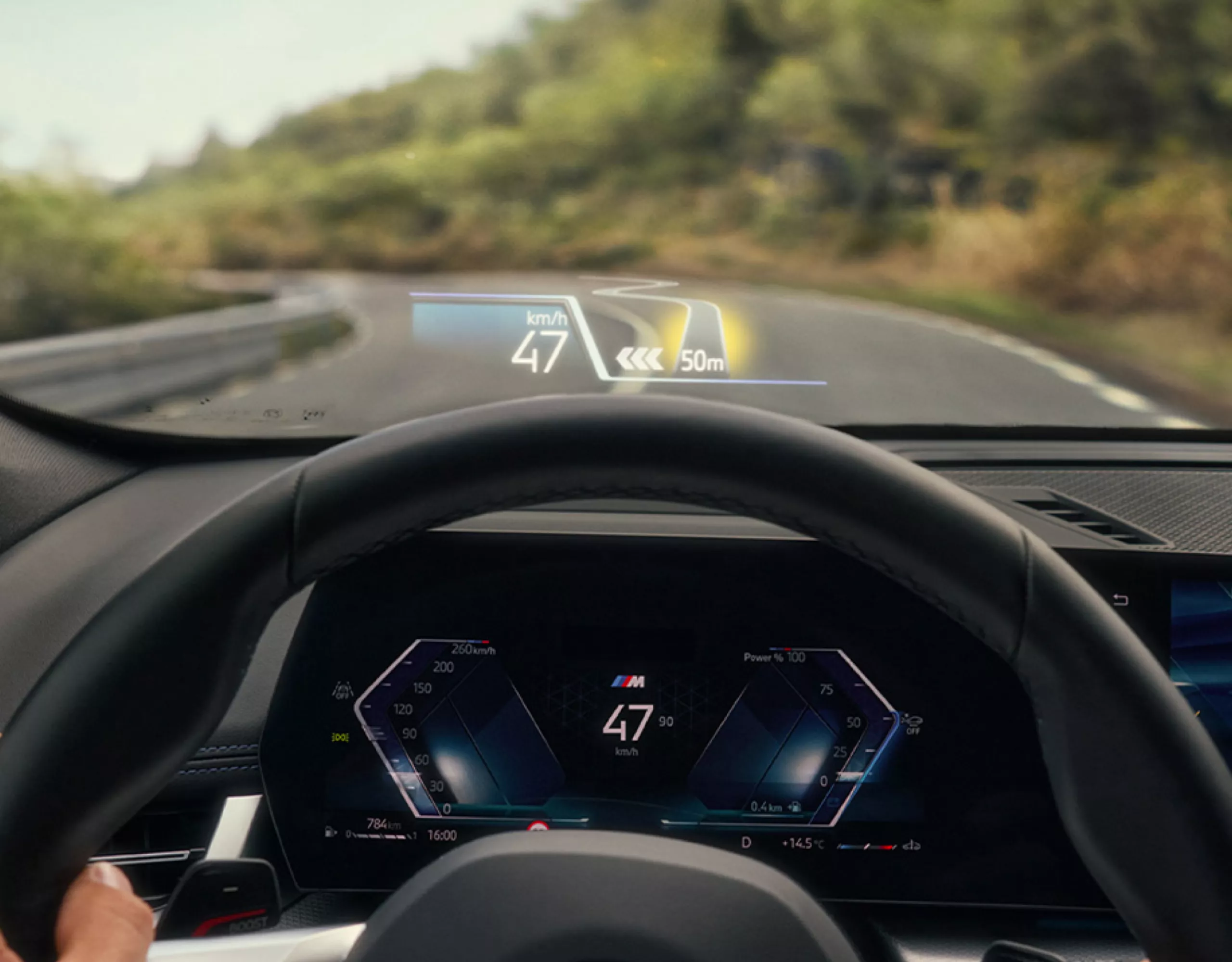 The BMW Panoramic iDrive is displaying the road layout for a difficult route