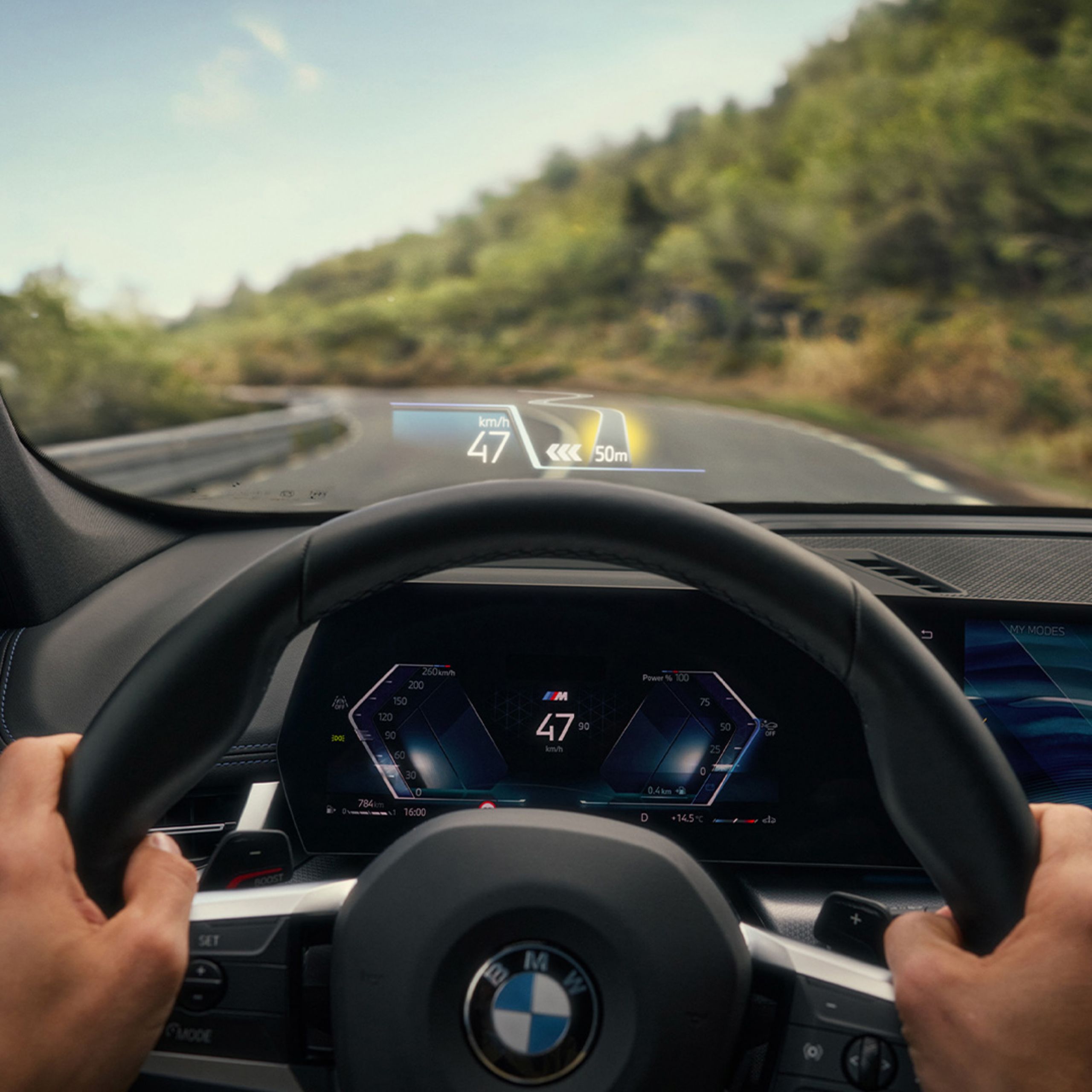 The BMW Panoramic iDrive is displaying the road layout for a difficult route