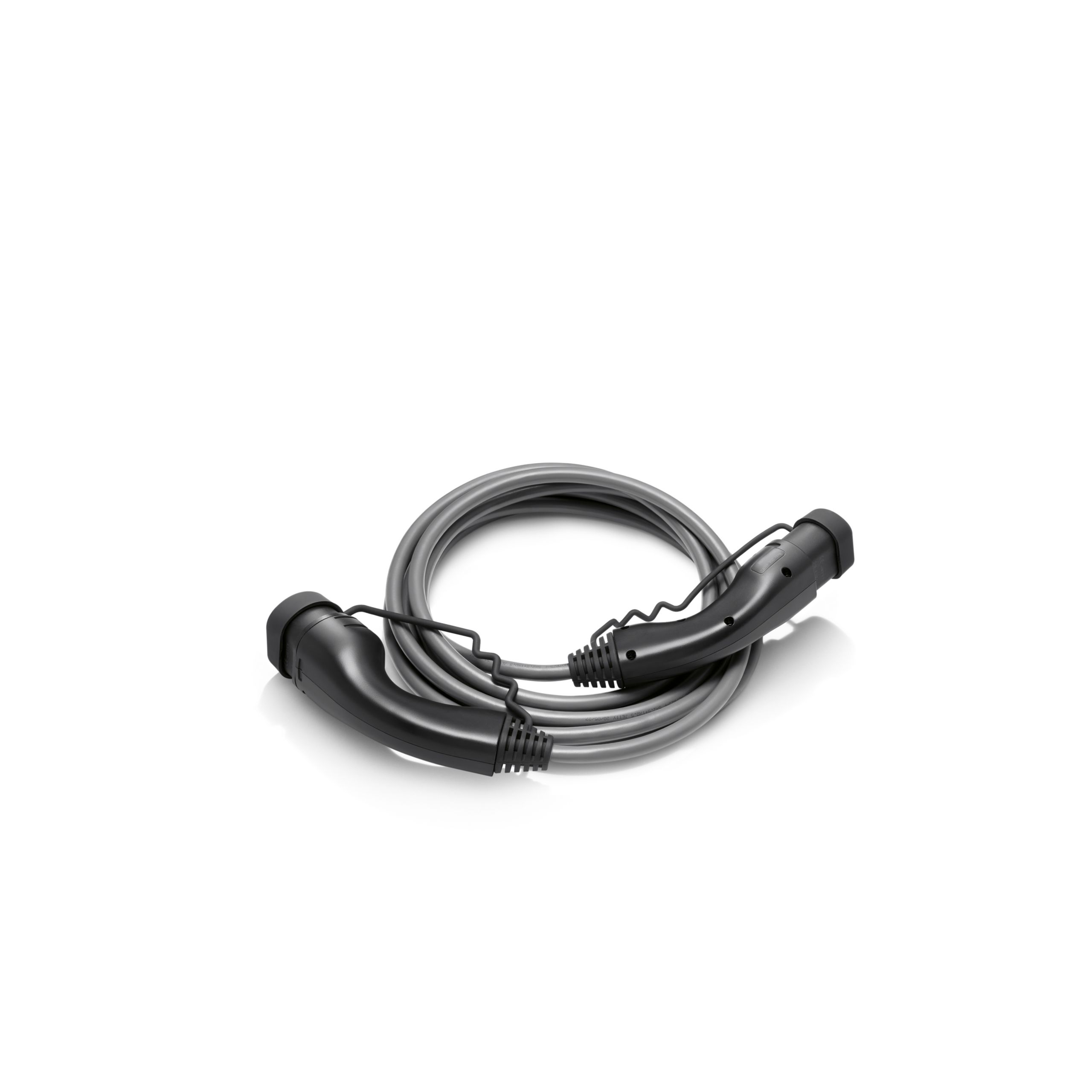 Šedý nabíjecí kabel Mode 3 se dvěma černými zástrčkami určený pro nabíjení na veřejných nabíjecích stanicích kompatibilních s režimem Mode 3 