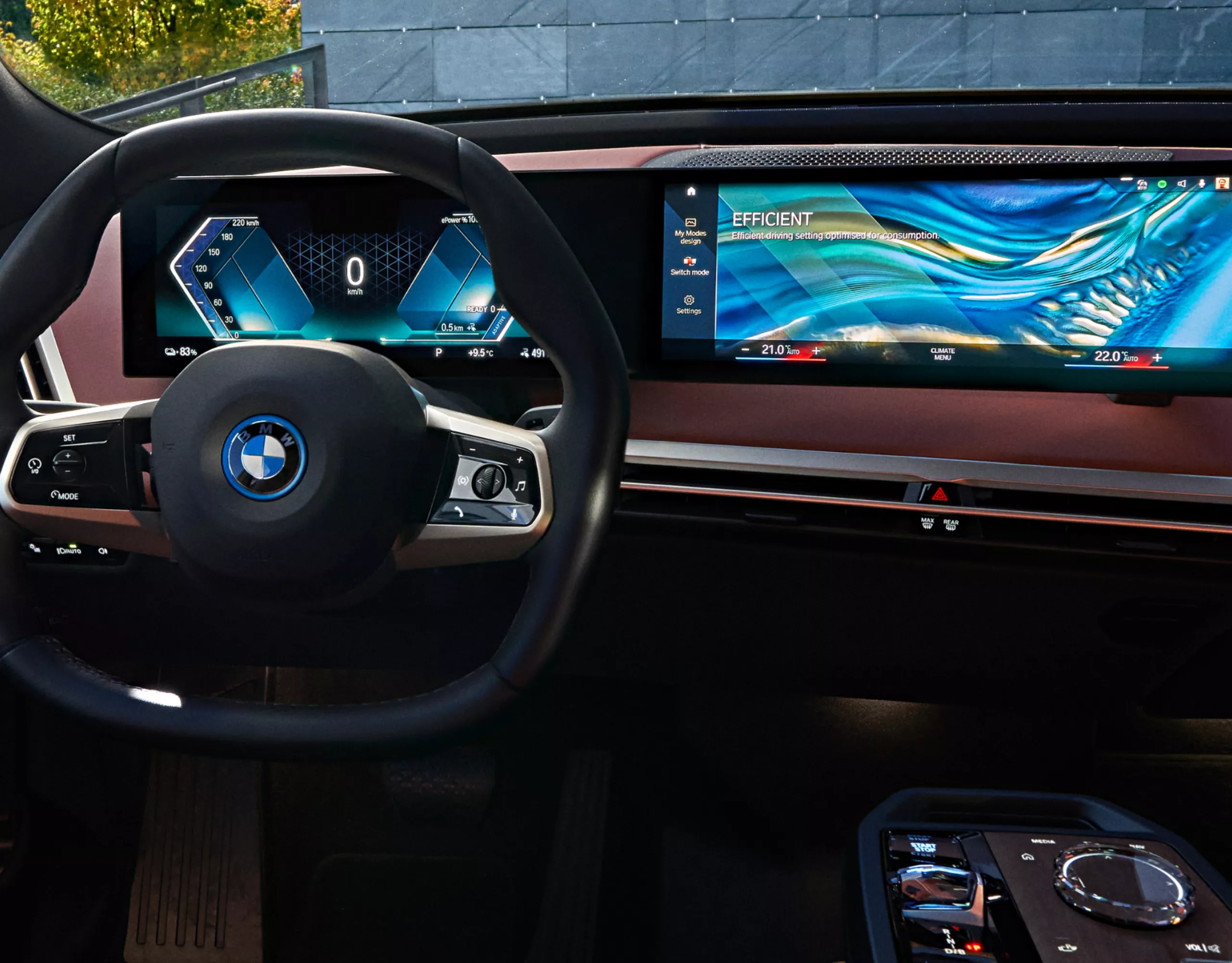 Cockpit of the BMW iX featuring the Curved Display