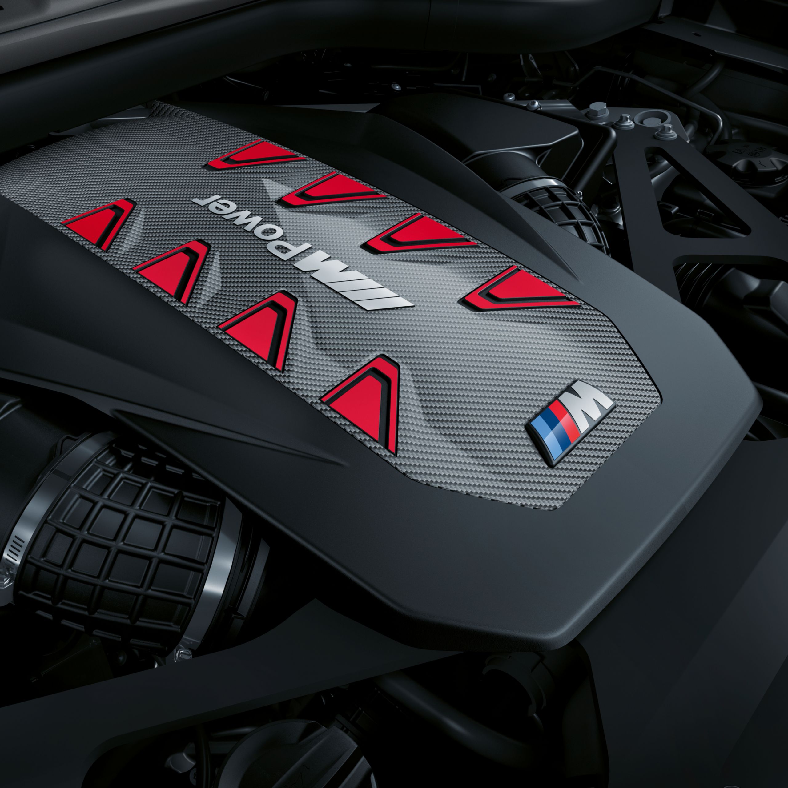 De motorafdekking van de BMW M TwinPower Turbo V8-cilinder benzinemotor in detail