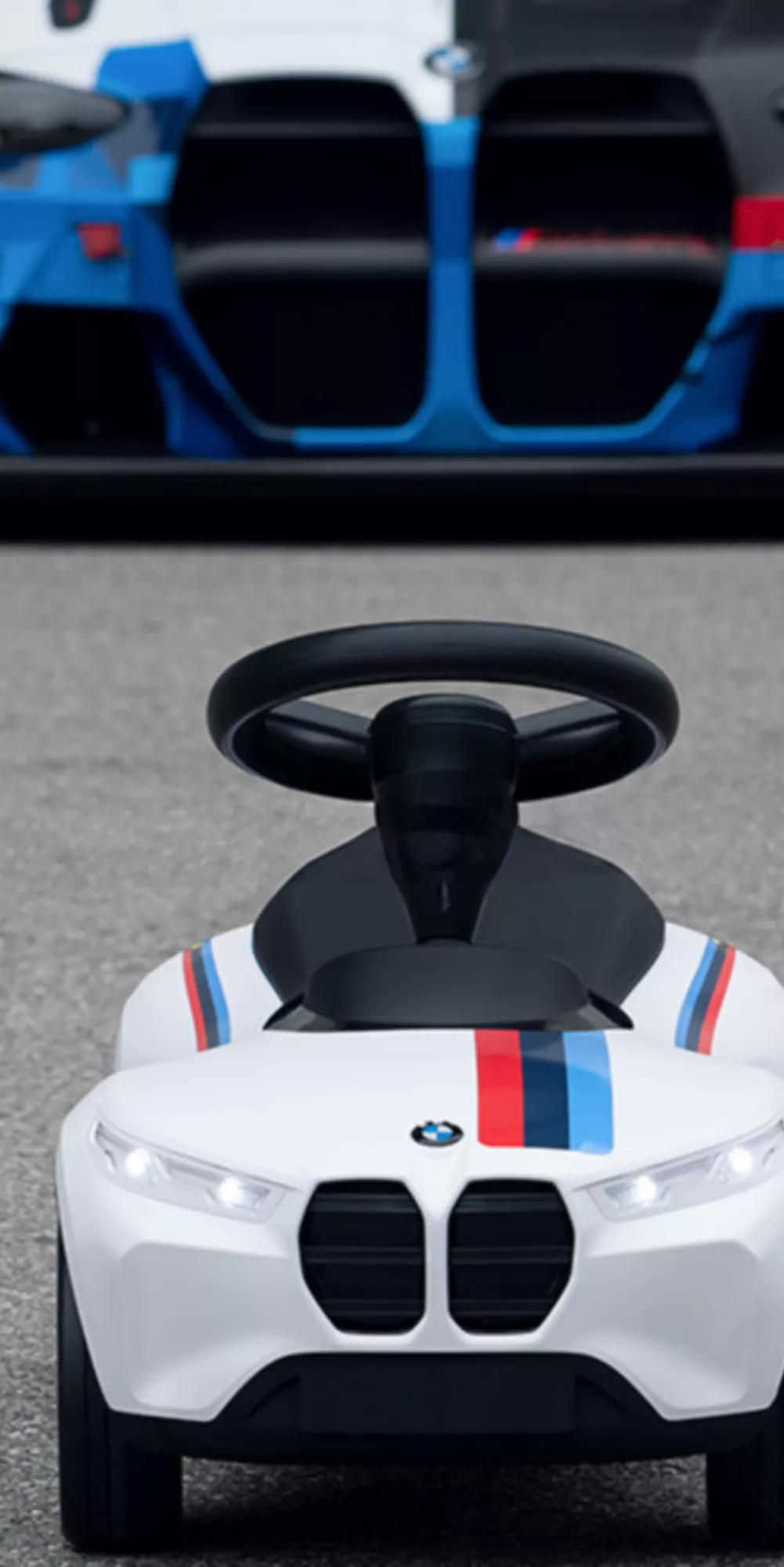 BMW Lifestyle White BMW Babyracer-children car with Seehaus stripes on the bonnet and side