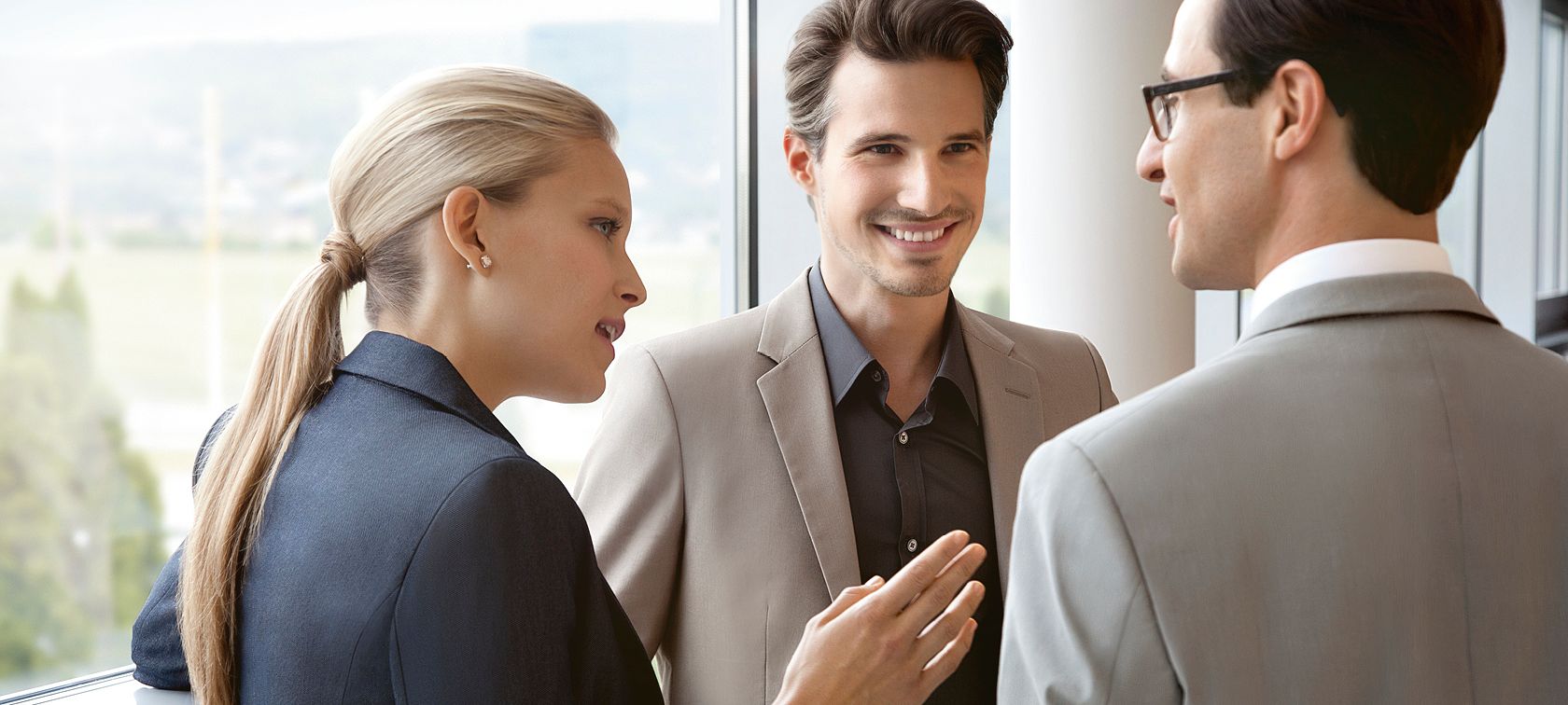 Three people in a debate