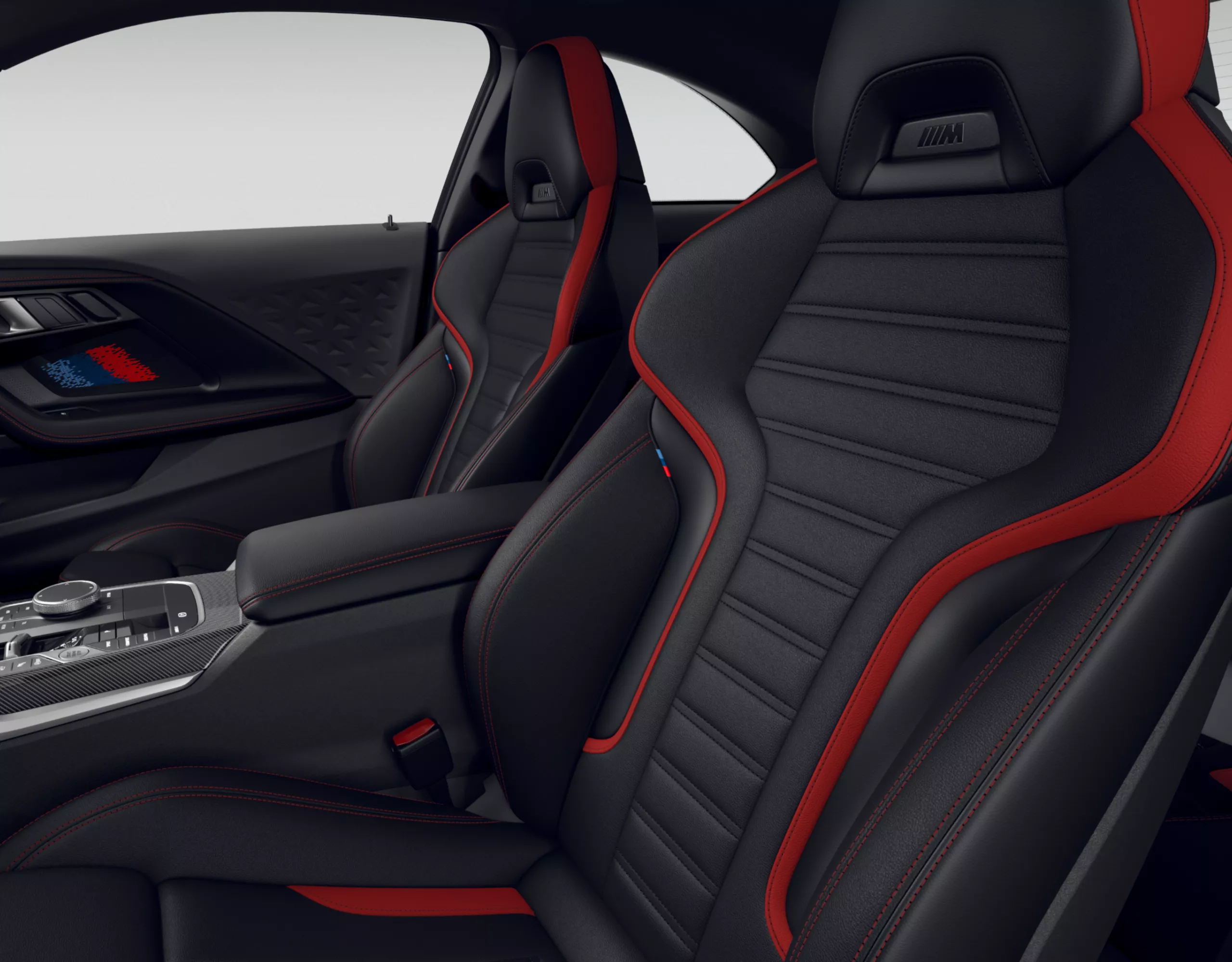 Heavily moulded driver-and-front-passenger-seat back of the M Sport seats and interior