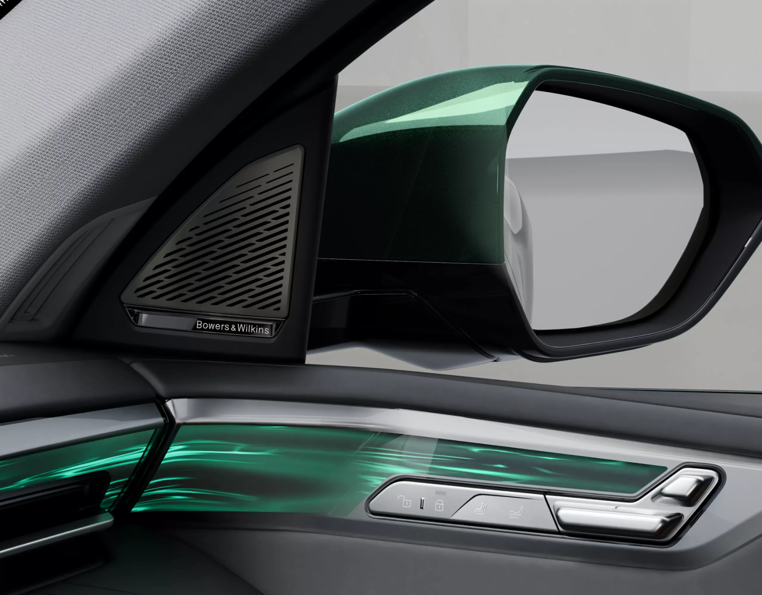 Inside of the door with controls and speaker