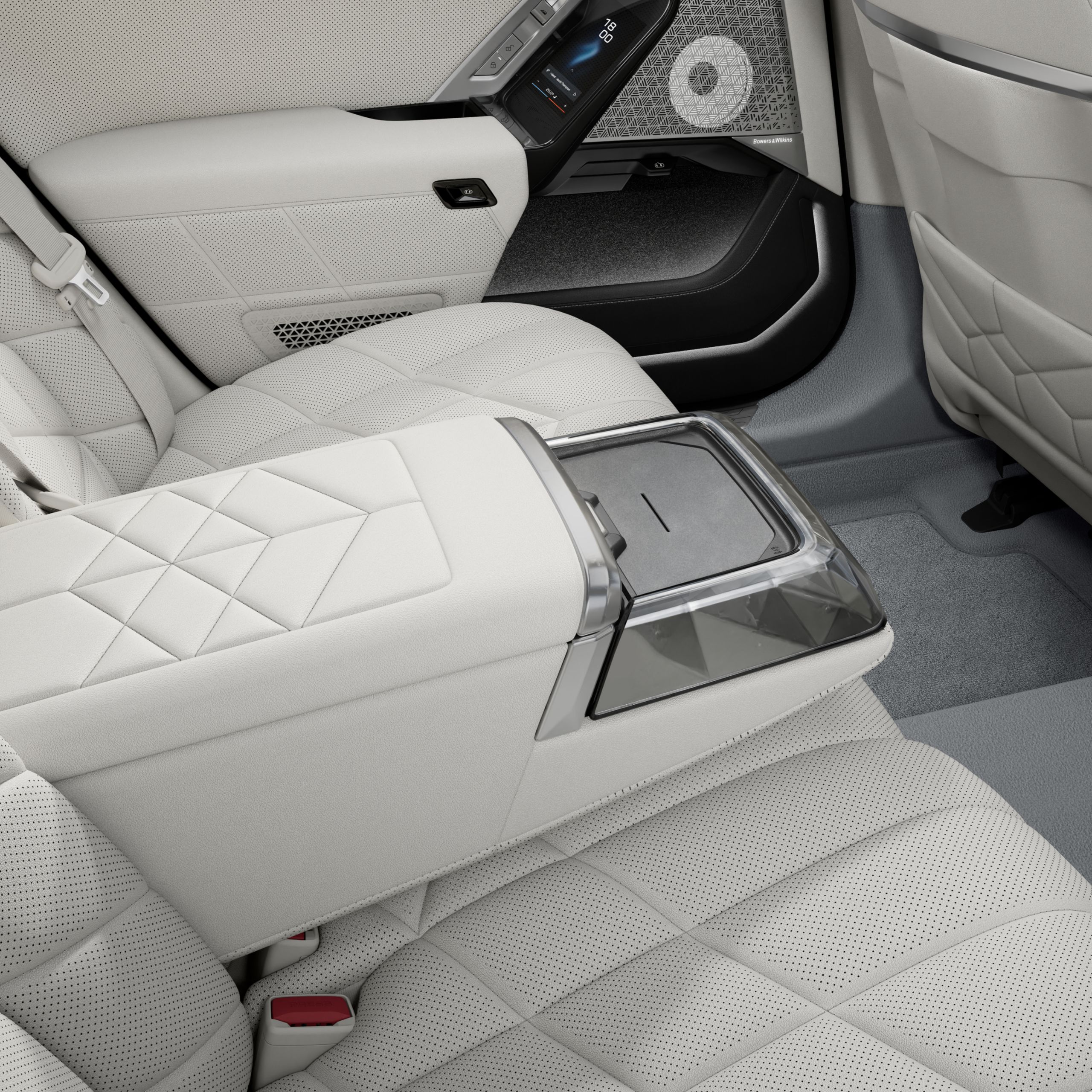 Close-up of the wireless charging cradle in the rear center console.