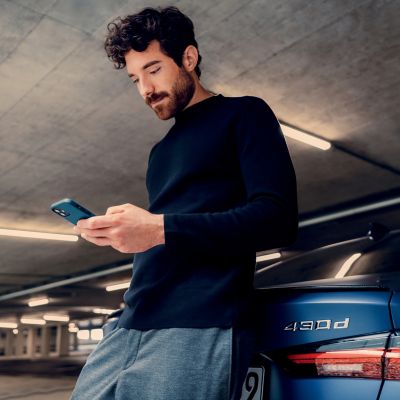 A man typing on his phone