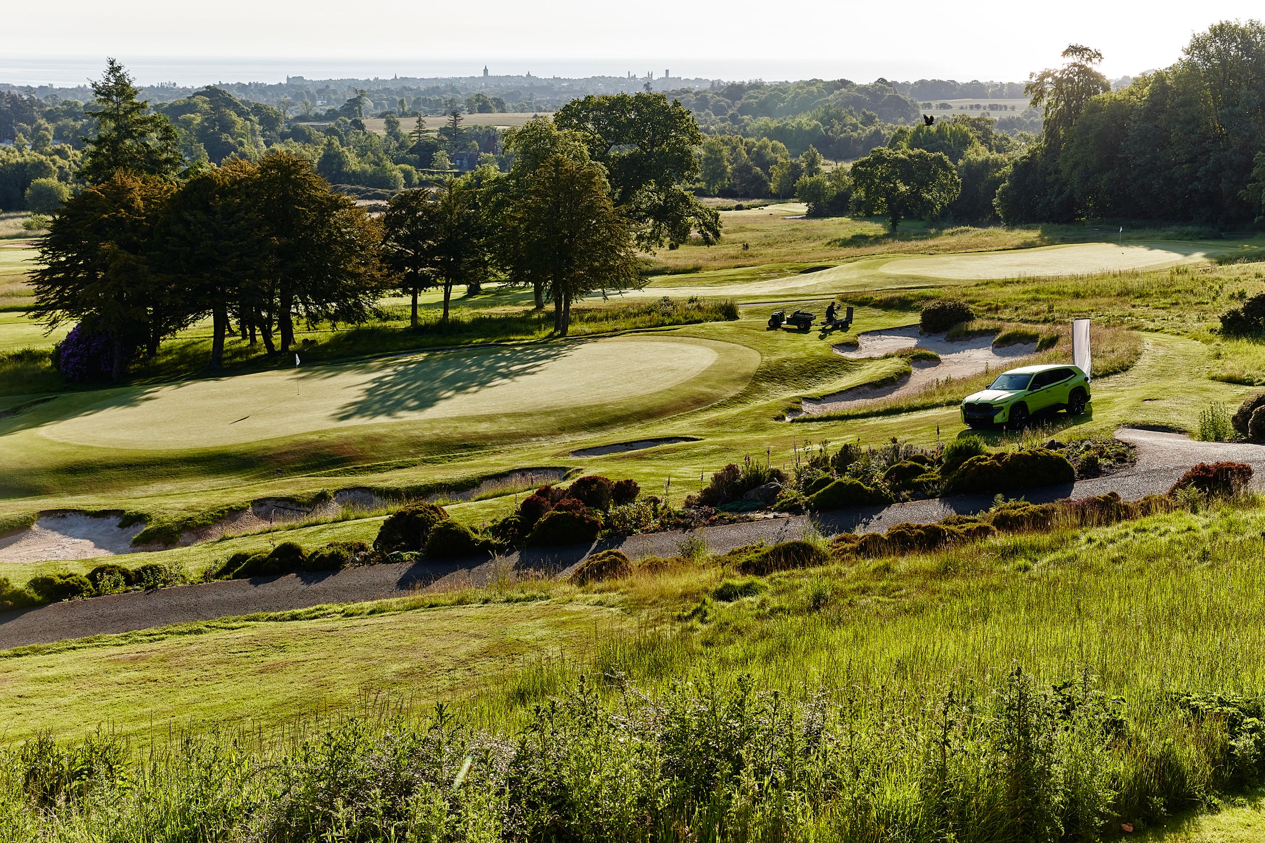 BMW Golf cup with the BMW XM in background