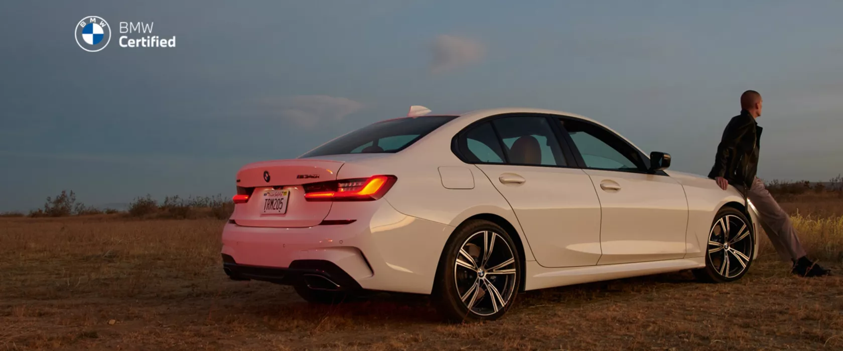 Man sitting on BMW