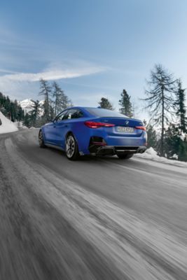 BMW i4 M50 Gran Coupé blue rear view