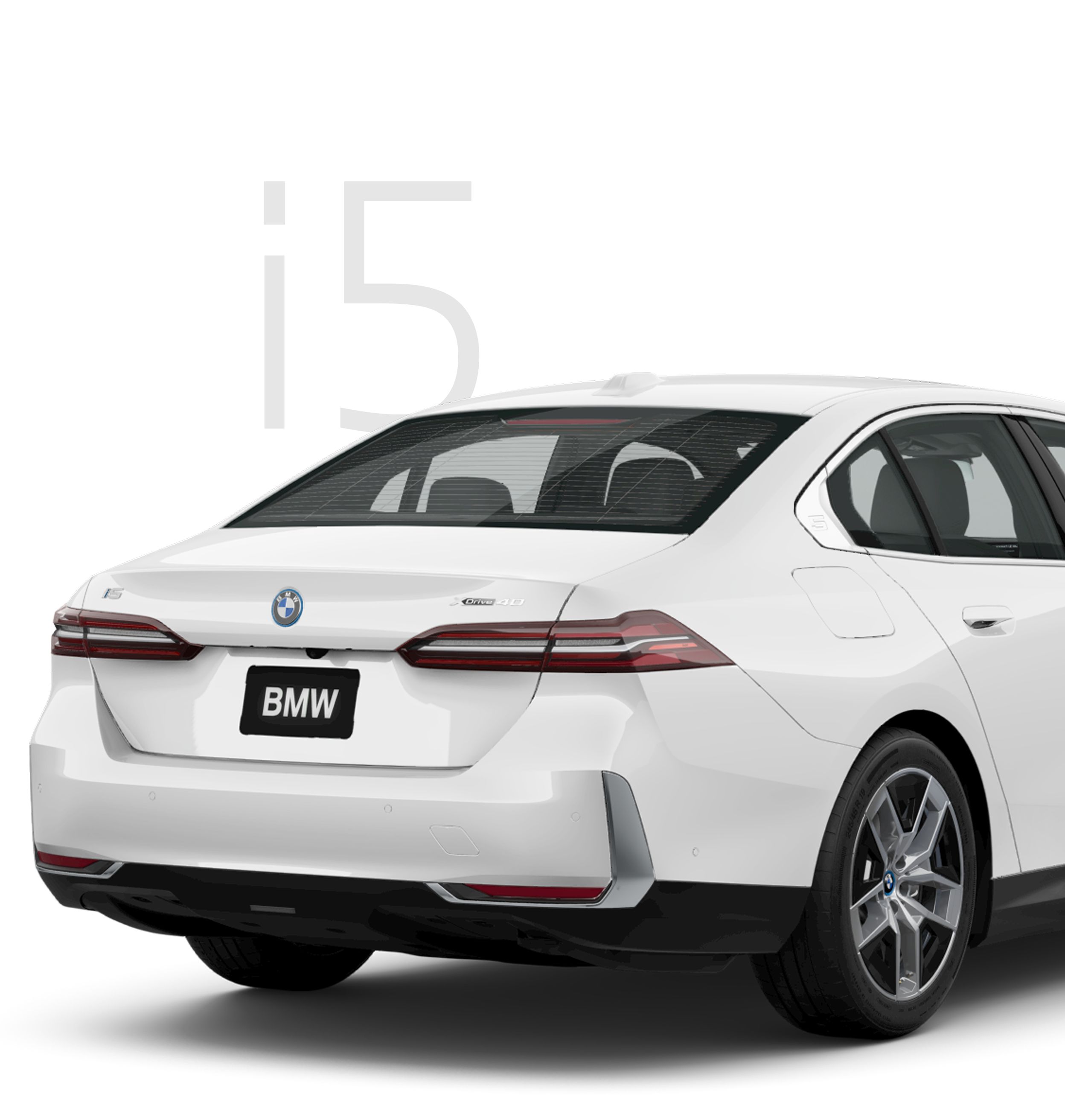 An image of the BMW i5 showing a rear view of the vehicle