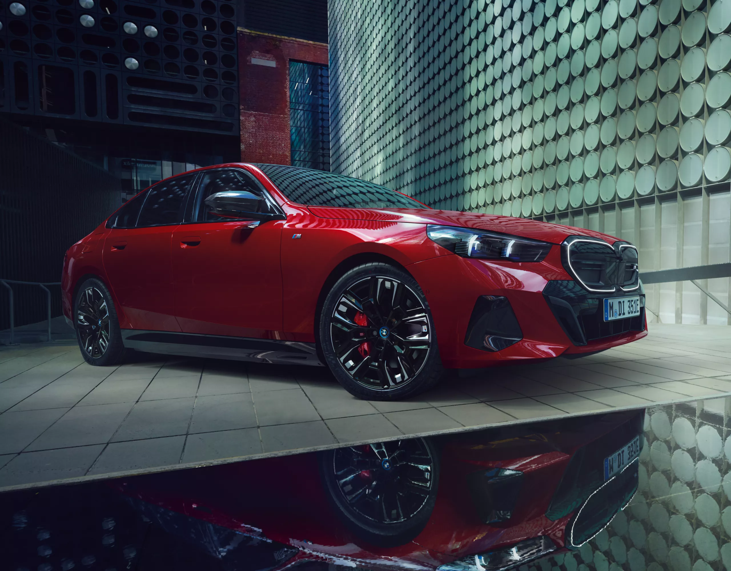 BMW i5 M60 xDrive red front view 