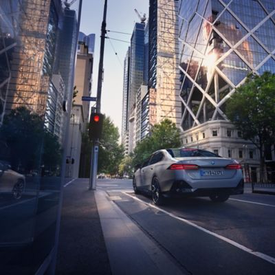 BMW i5 grey rear view