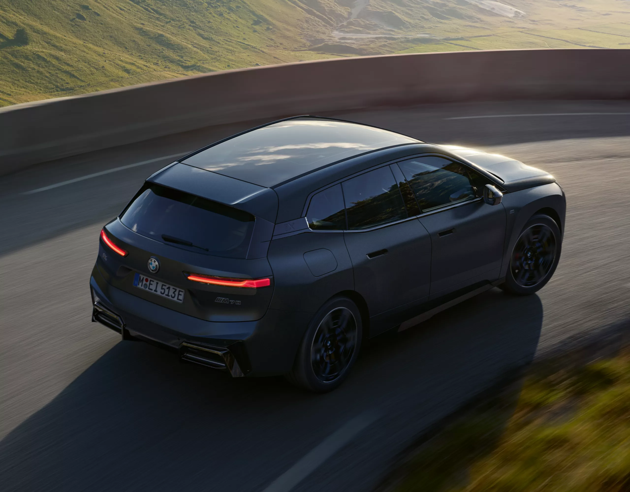 BMW iX M70 black rear view 